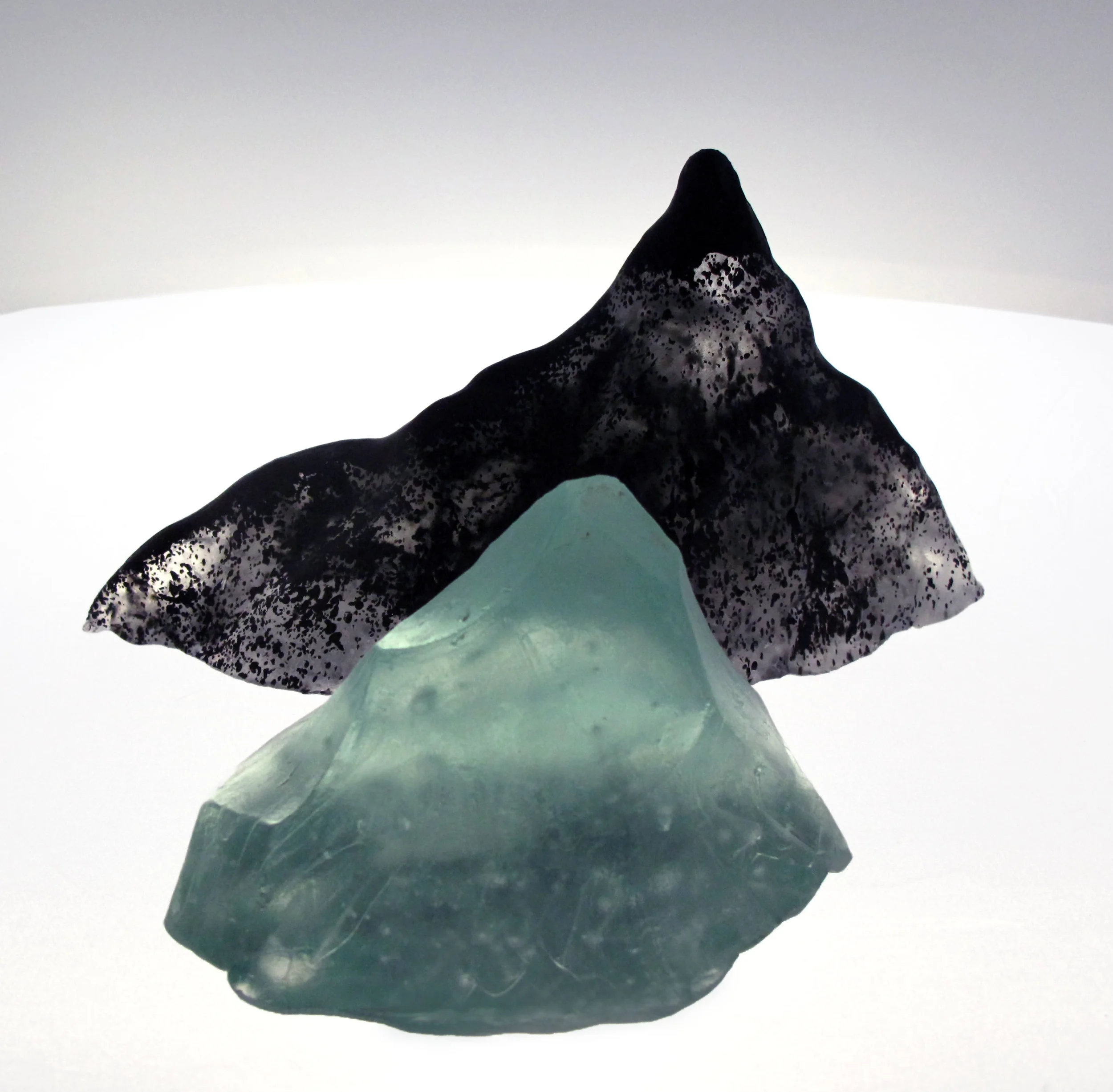   Munro Series - Volcano + Glacier  Paperweights  Cast glass    Only one cast is made from each hand modeled clay form, making every Munro in the series unique. 