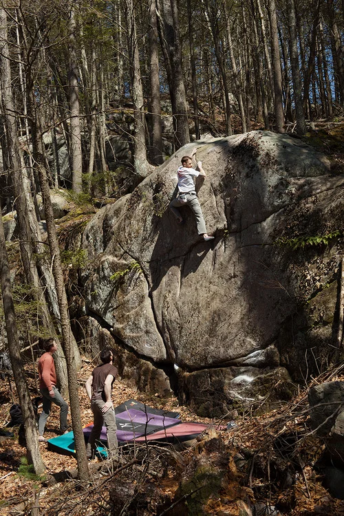 Marc Troob on a high V3 first ascent at Beach Pond in Southern RI. Photograph by Chris Motta.