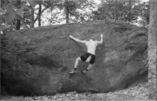 Ed Sewall bouldering on the Whitey Whale (the classic Slick 50 is just to the right of this photo). This boulder is now covered with graffiti.