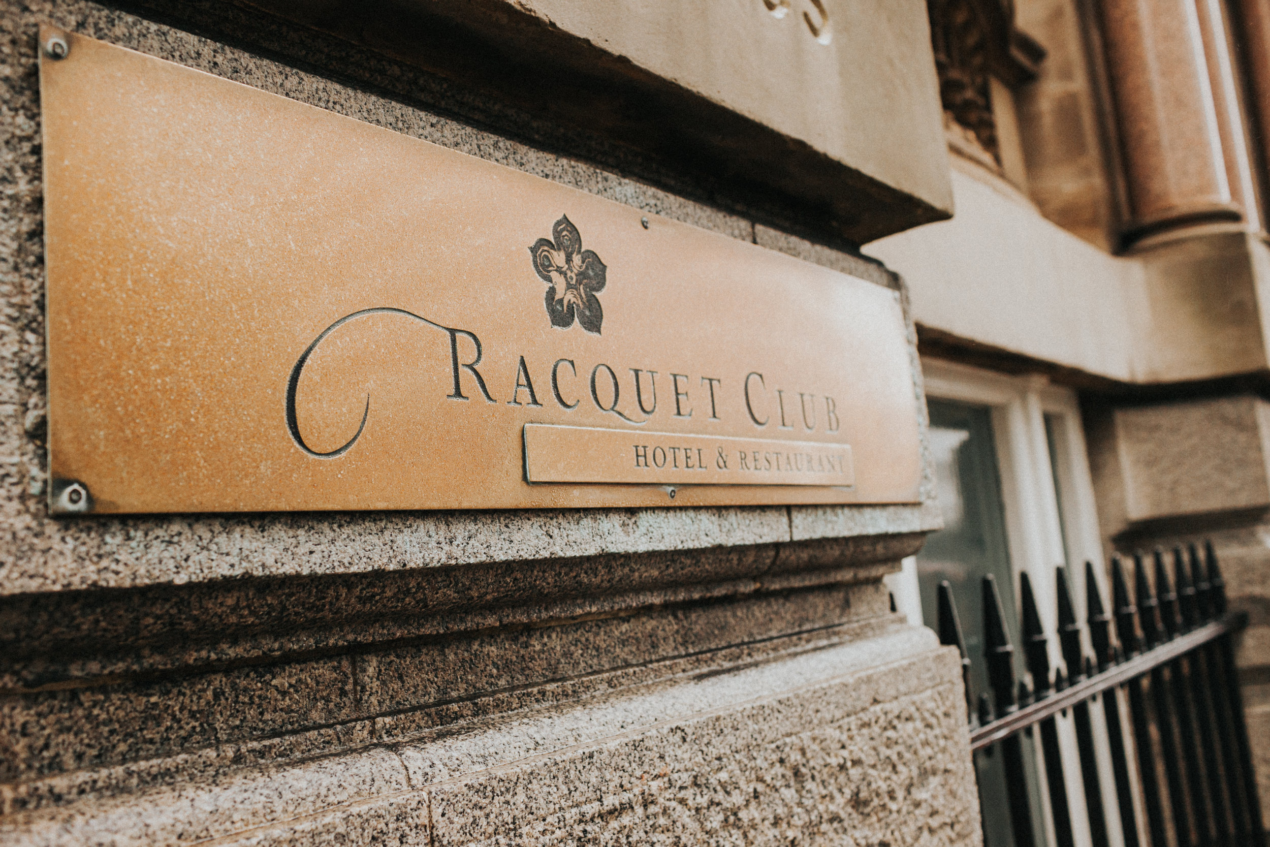 Racquet Club sign