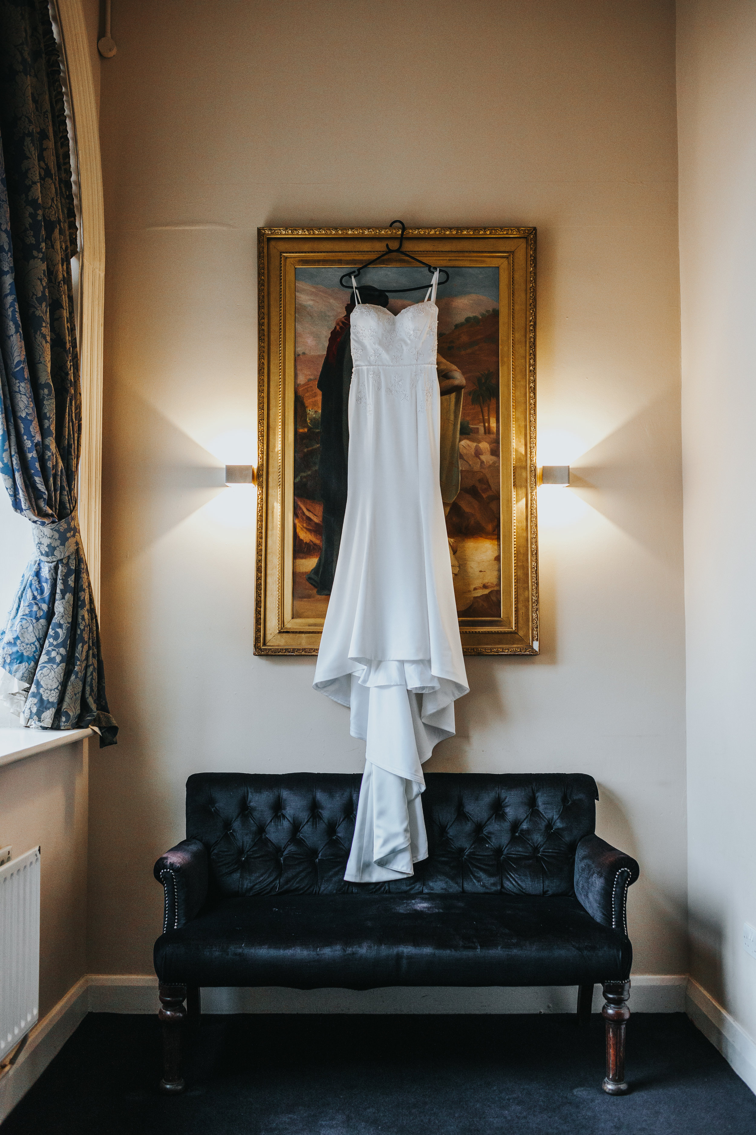 Dress hanging on painting