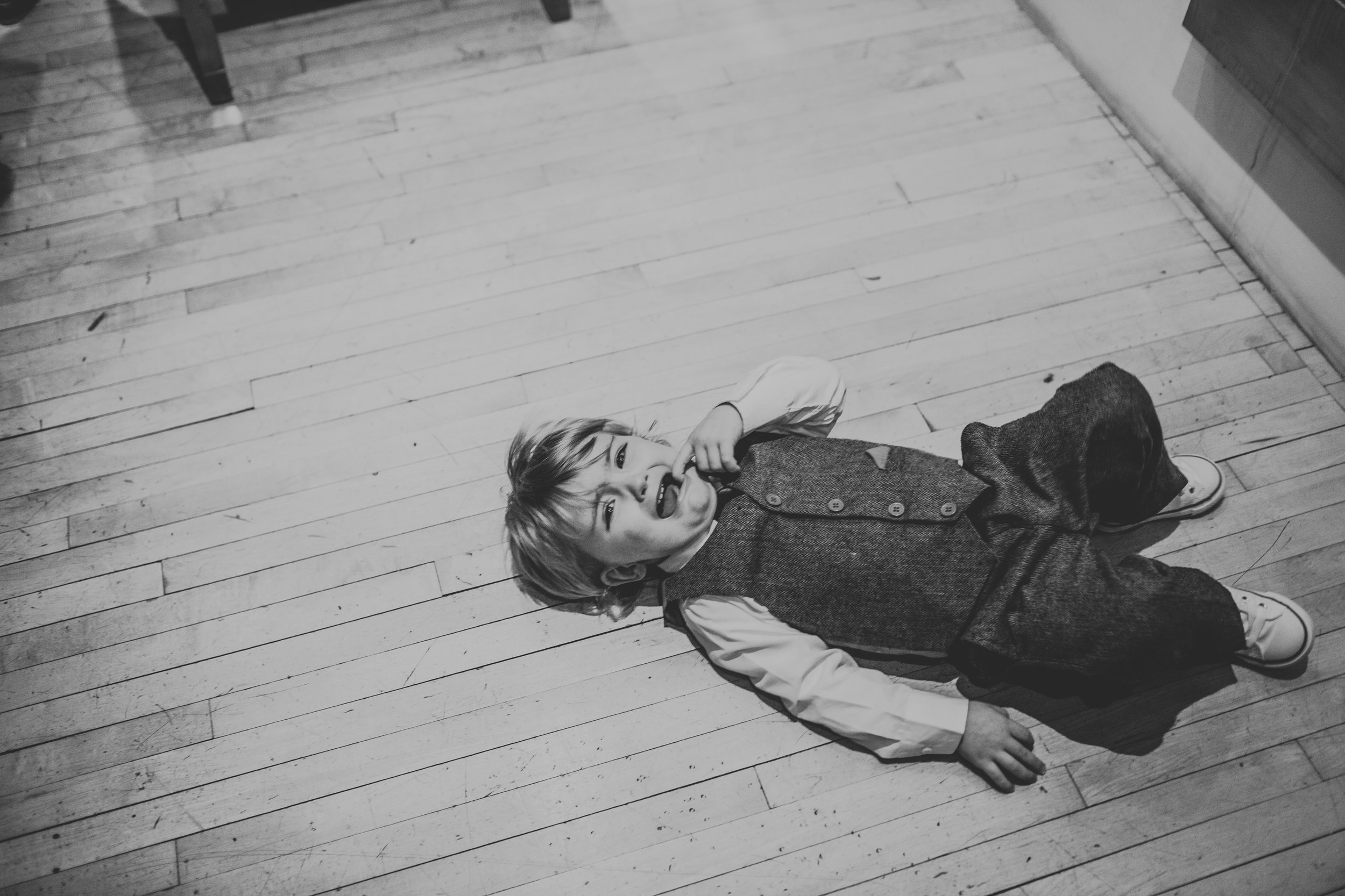 Child on the floor crying