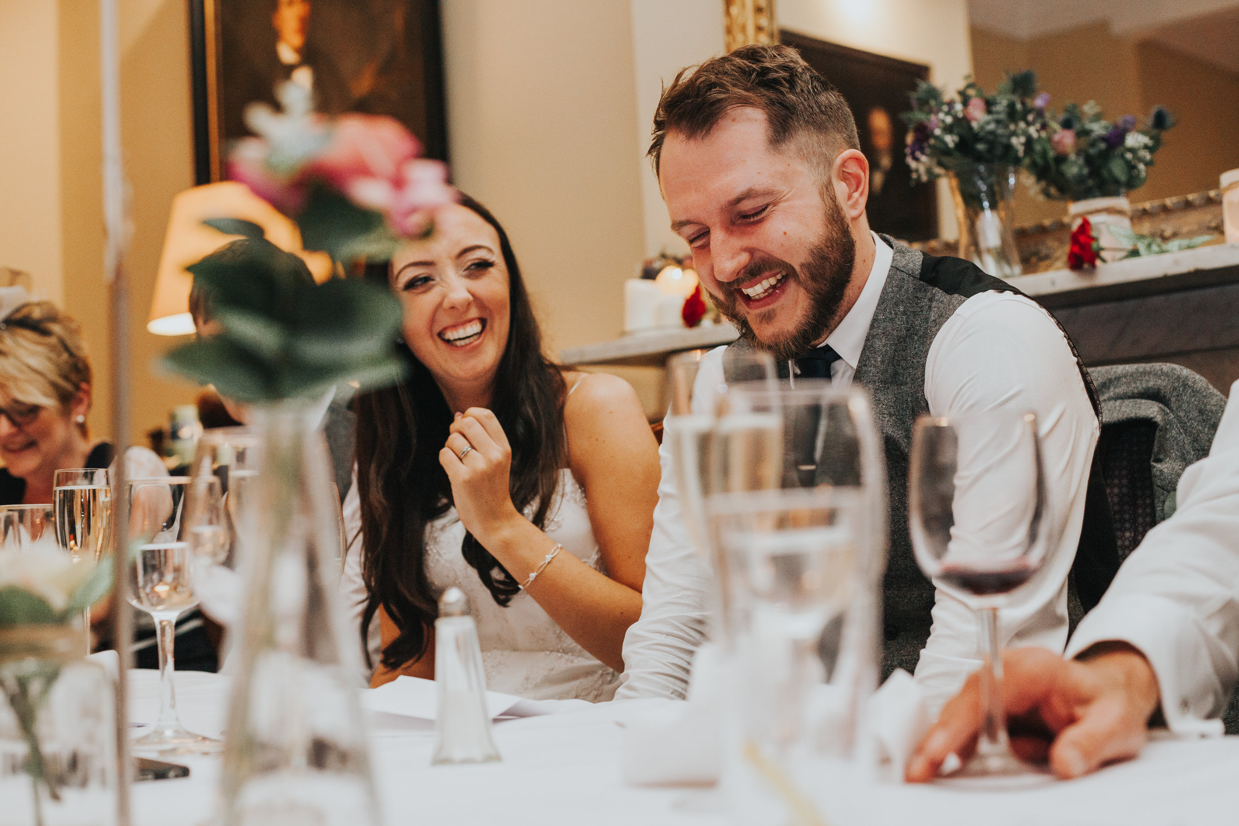 Groom laughing