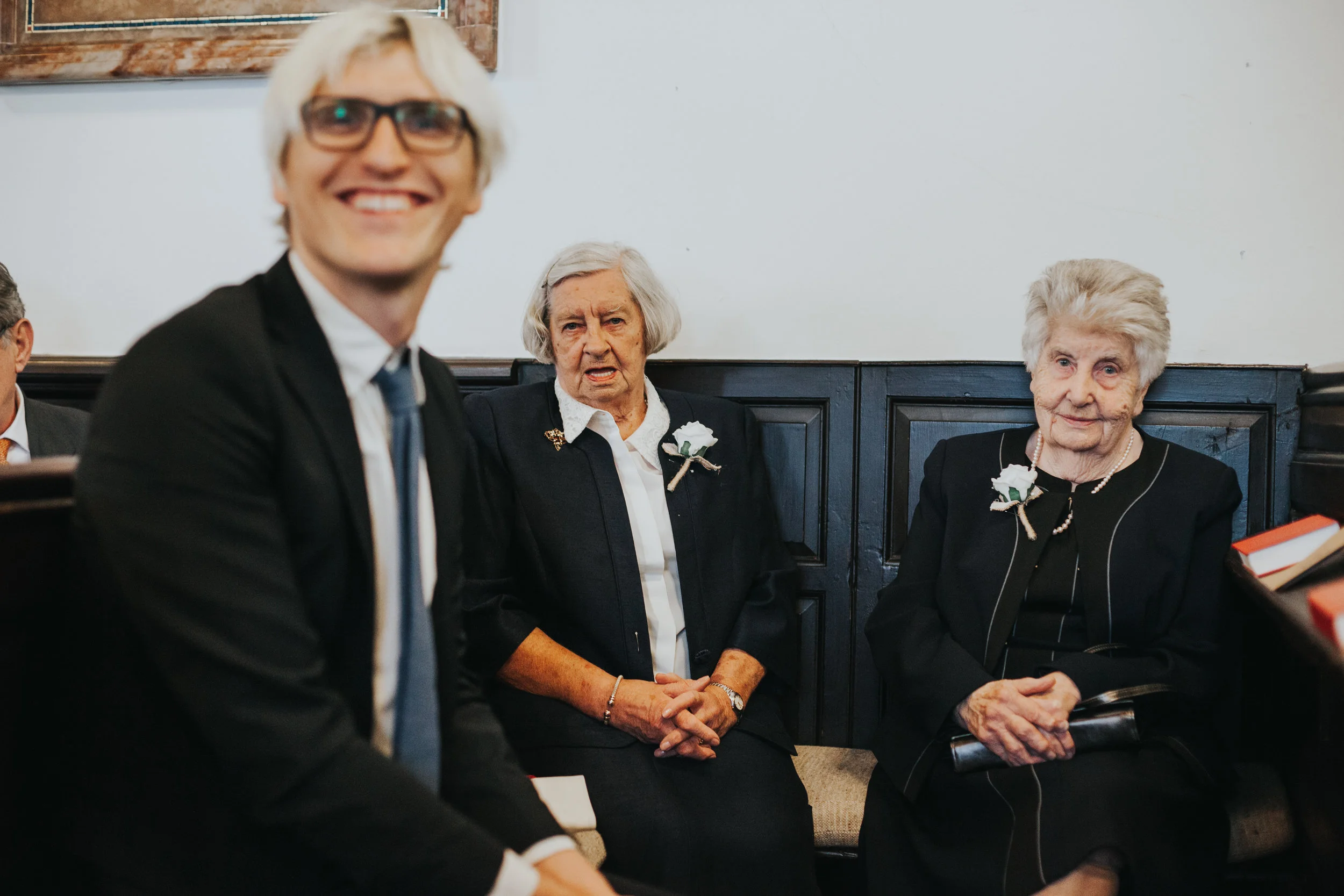  Two ladies dressed in black and a man with bleached and glasses.&nbsp; 
