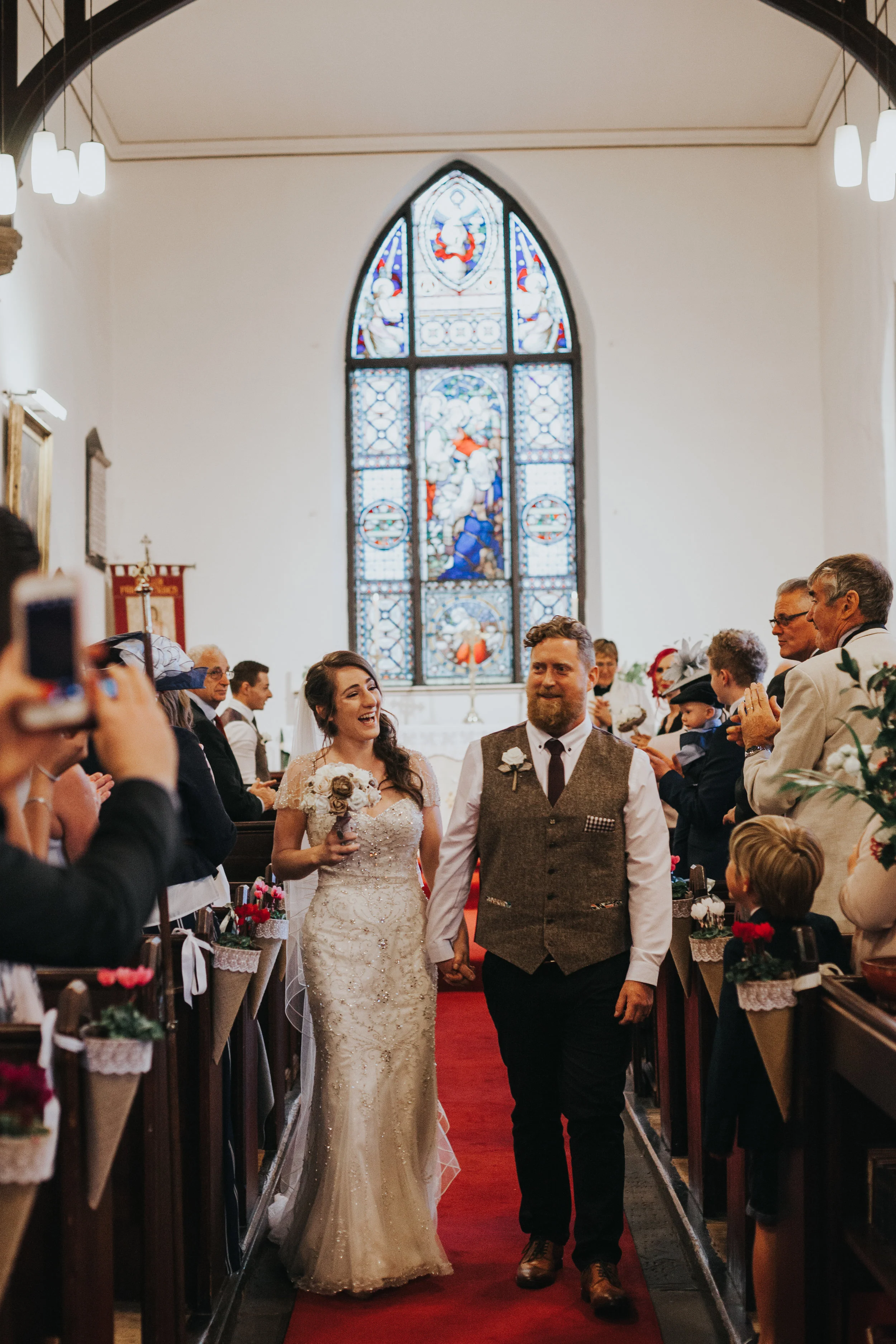  Man and Wife leave church joyfully.&nbsp; 
