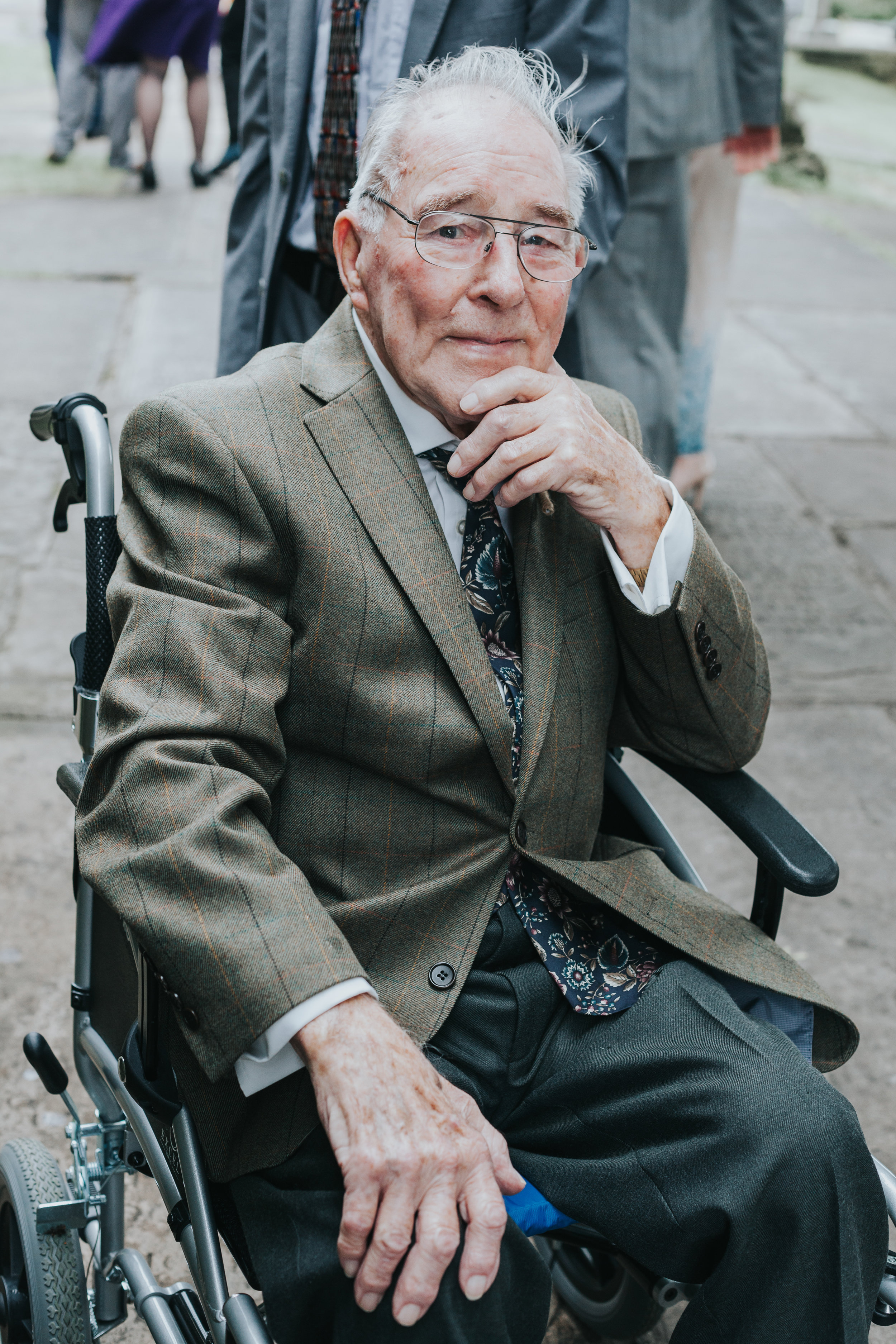  Granddad poses for photo outside church like a pro.&nbsp; 