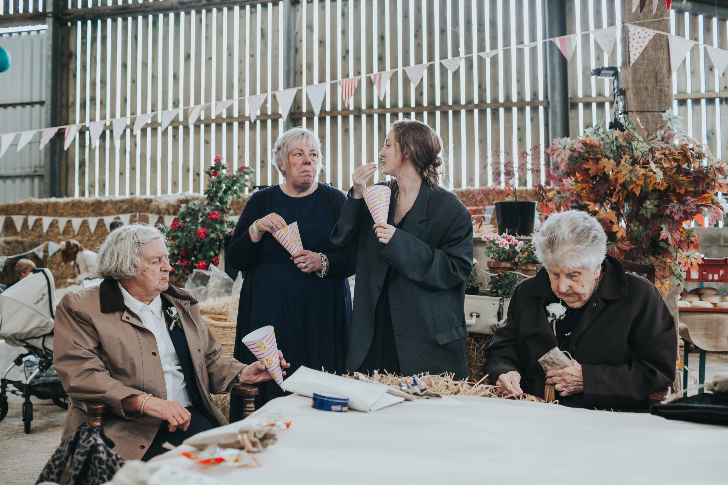  4 ladies eating popcorn 