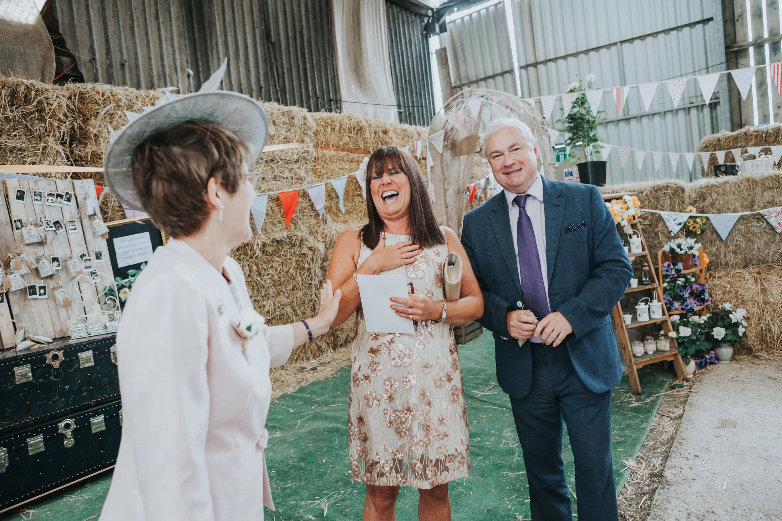  Lady laughing with Mother of the Bride. 