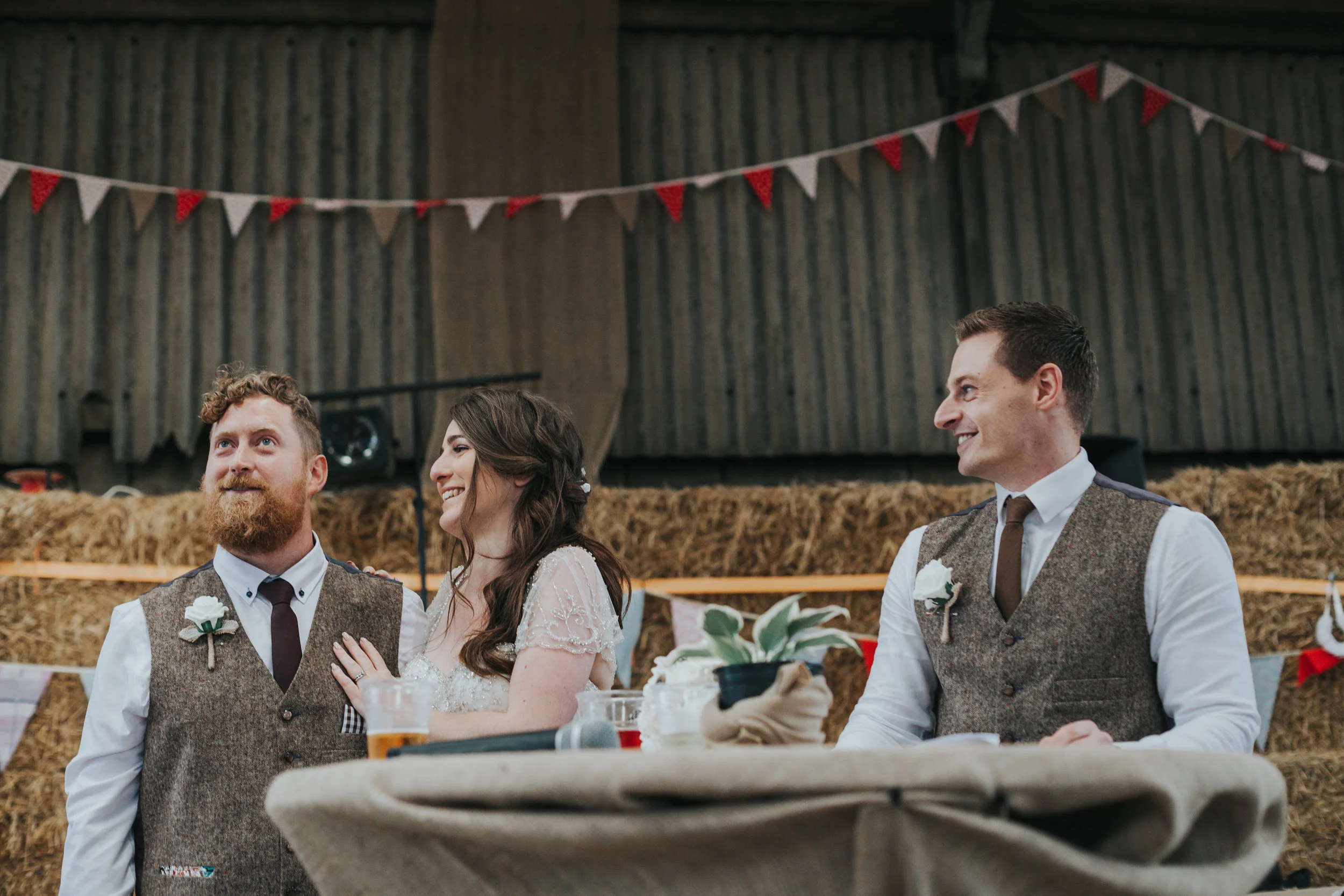  Bride, Groom and Best Man all have a little moment during speeches 