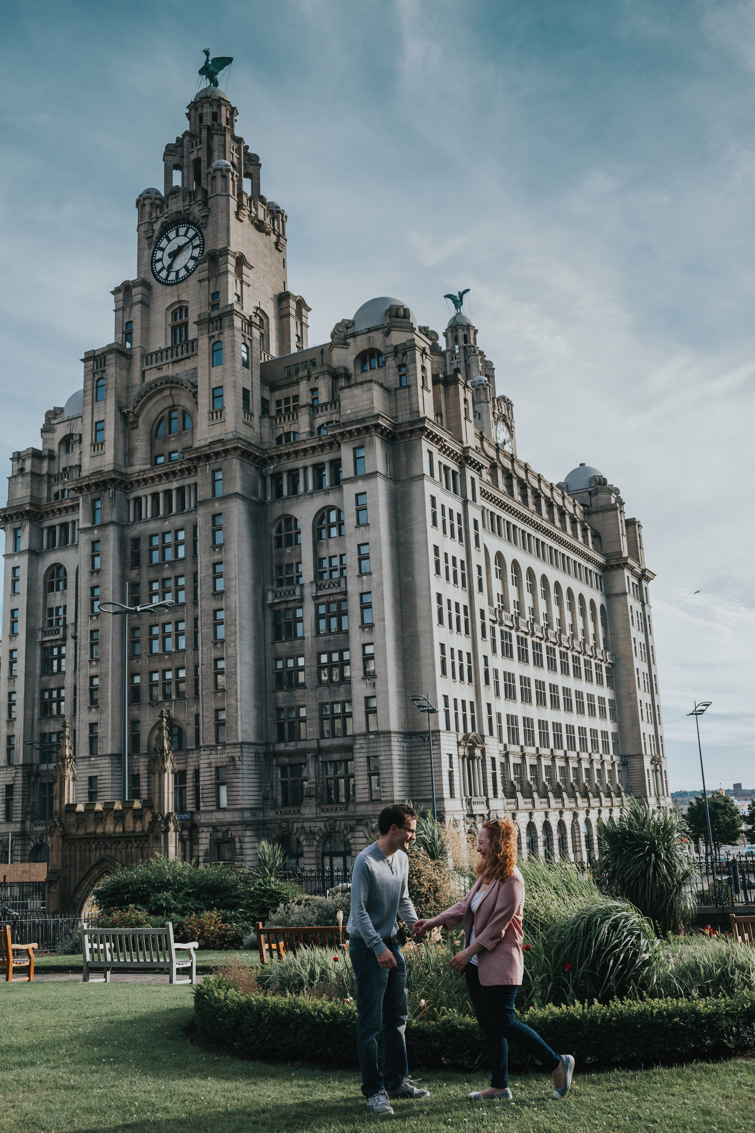 Couple in front of Liver Buildings