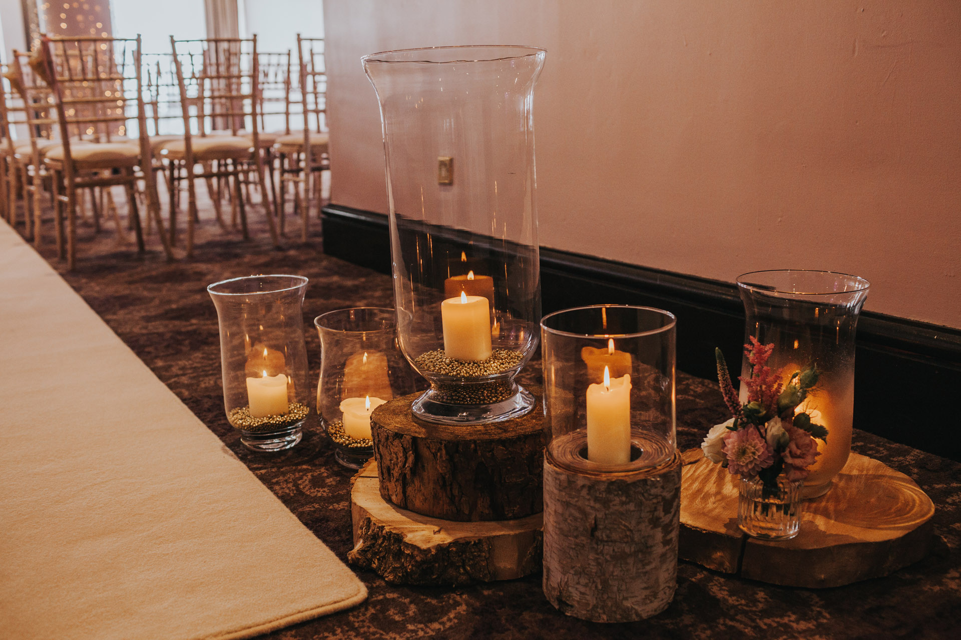 Candles decorate the floor in the room where the ceremony will take place.