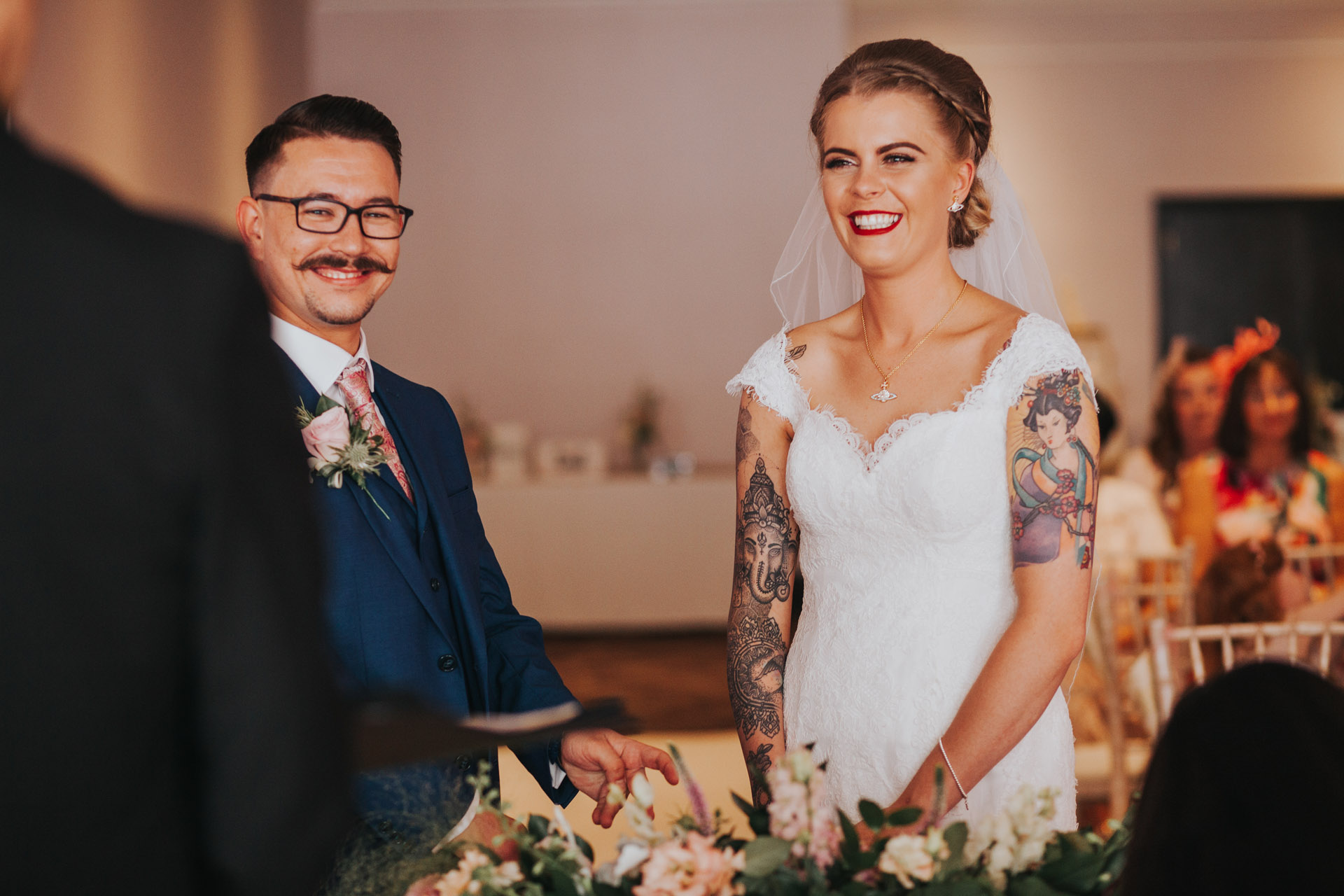 Bride and groom look happy on their wedding day in Manchester
