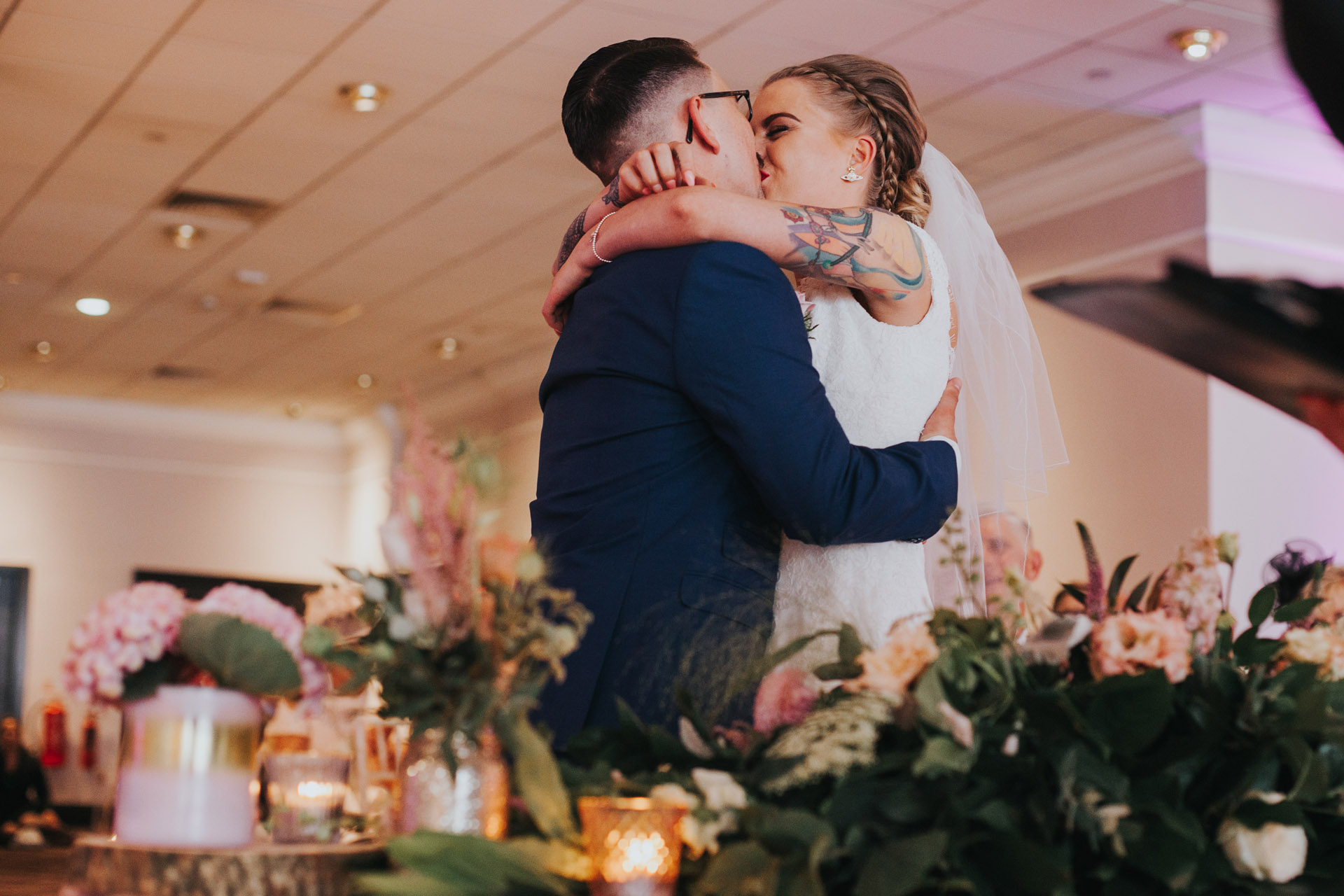 Bride and Groom kiss. 