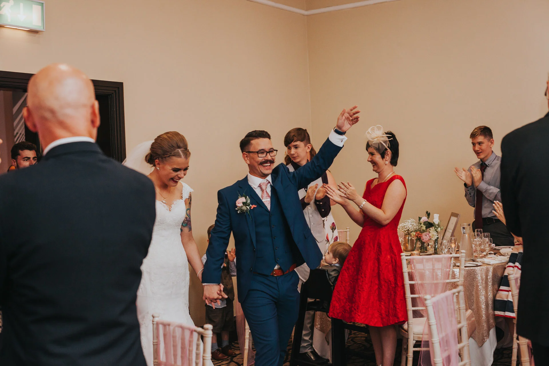 Bride and Groom Enter the wedding breakfast