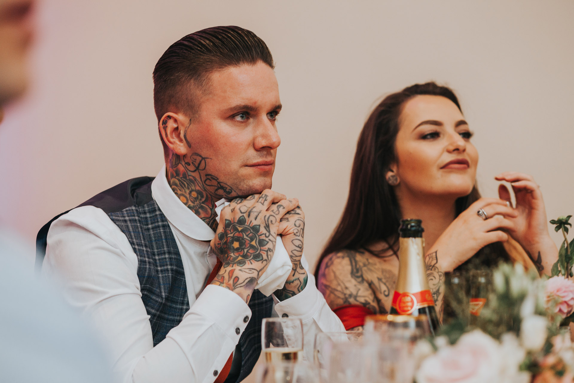 Guests listening to father of the brides speech.