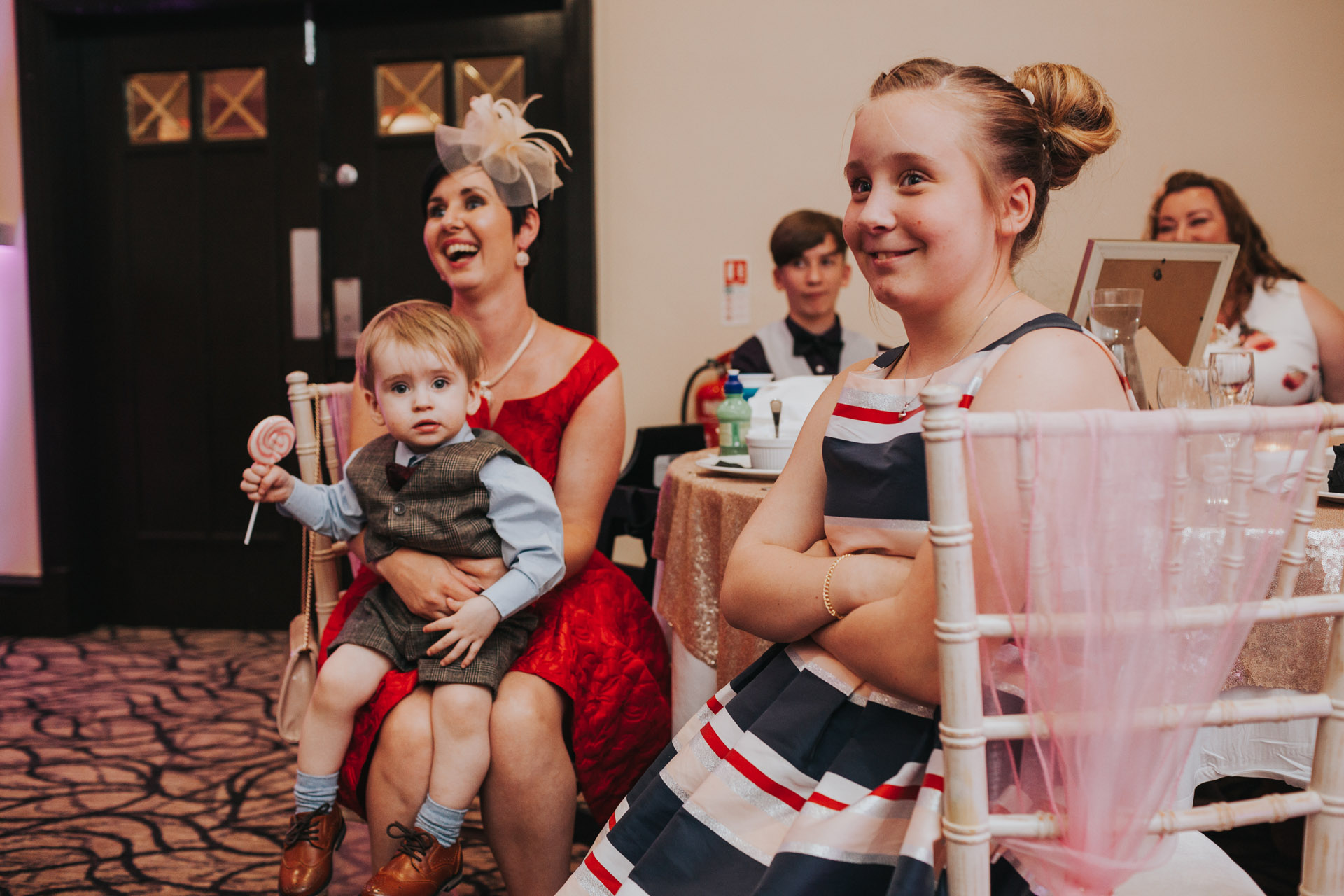 Children listening to grooms speech.