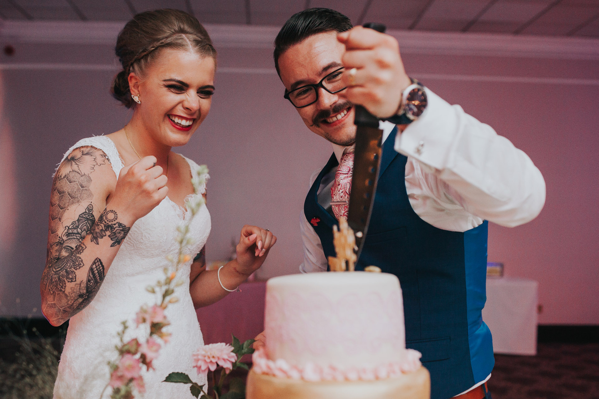 Bride and Groom cut cake. 