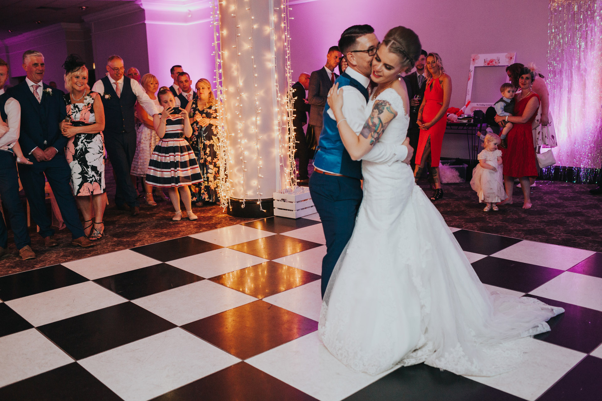 Guests watch first dance. 