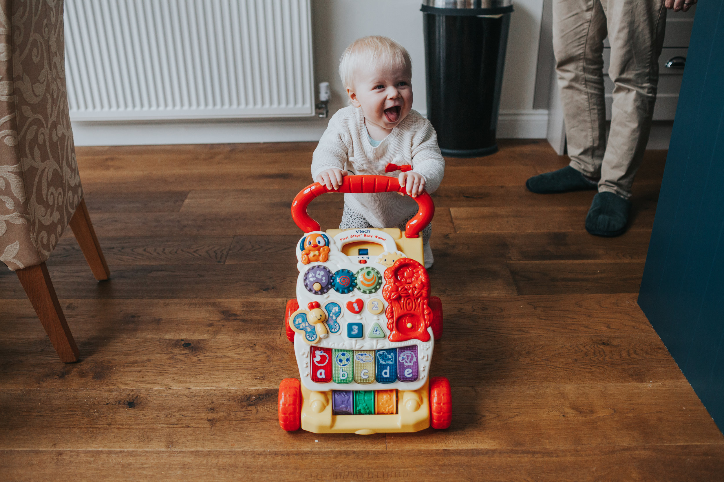 Evie takes her stroller for a spin.