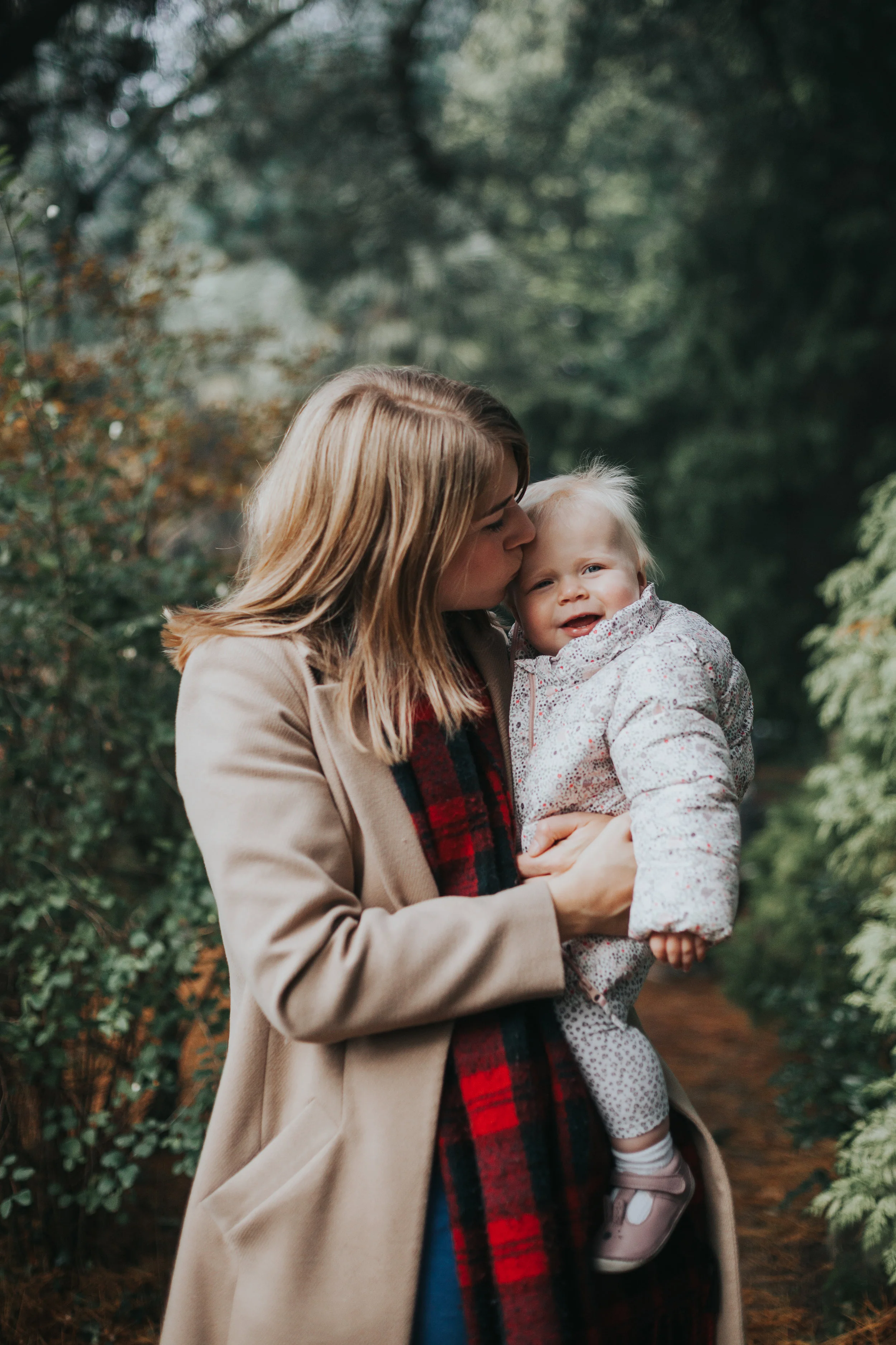 Mum kissing Evie.