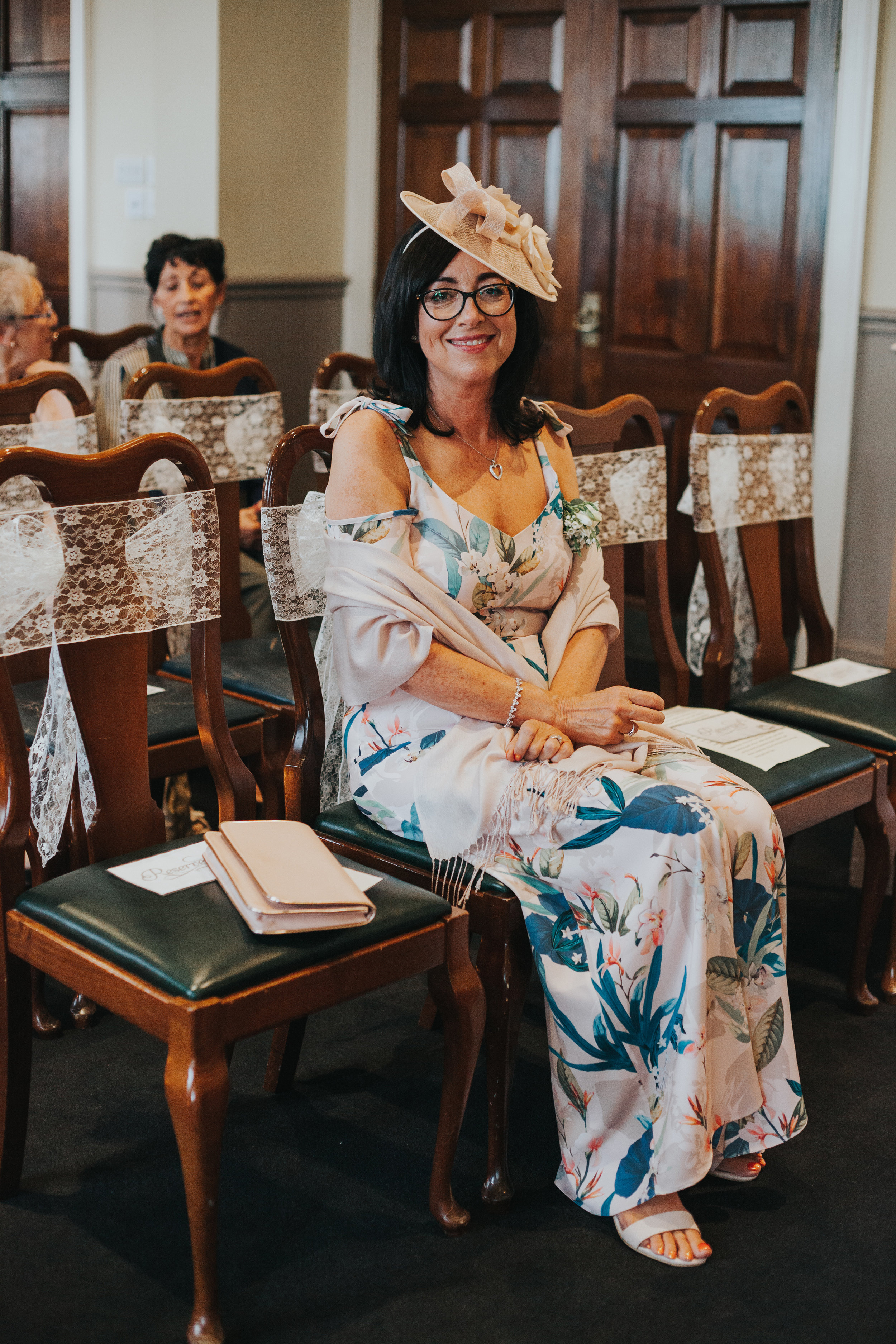 Brides mother in her wedding clothes.