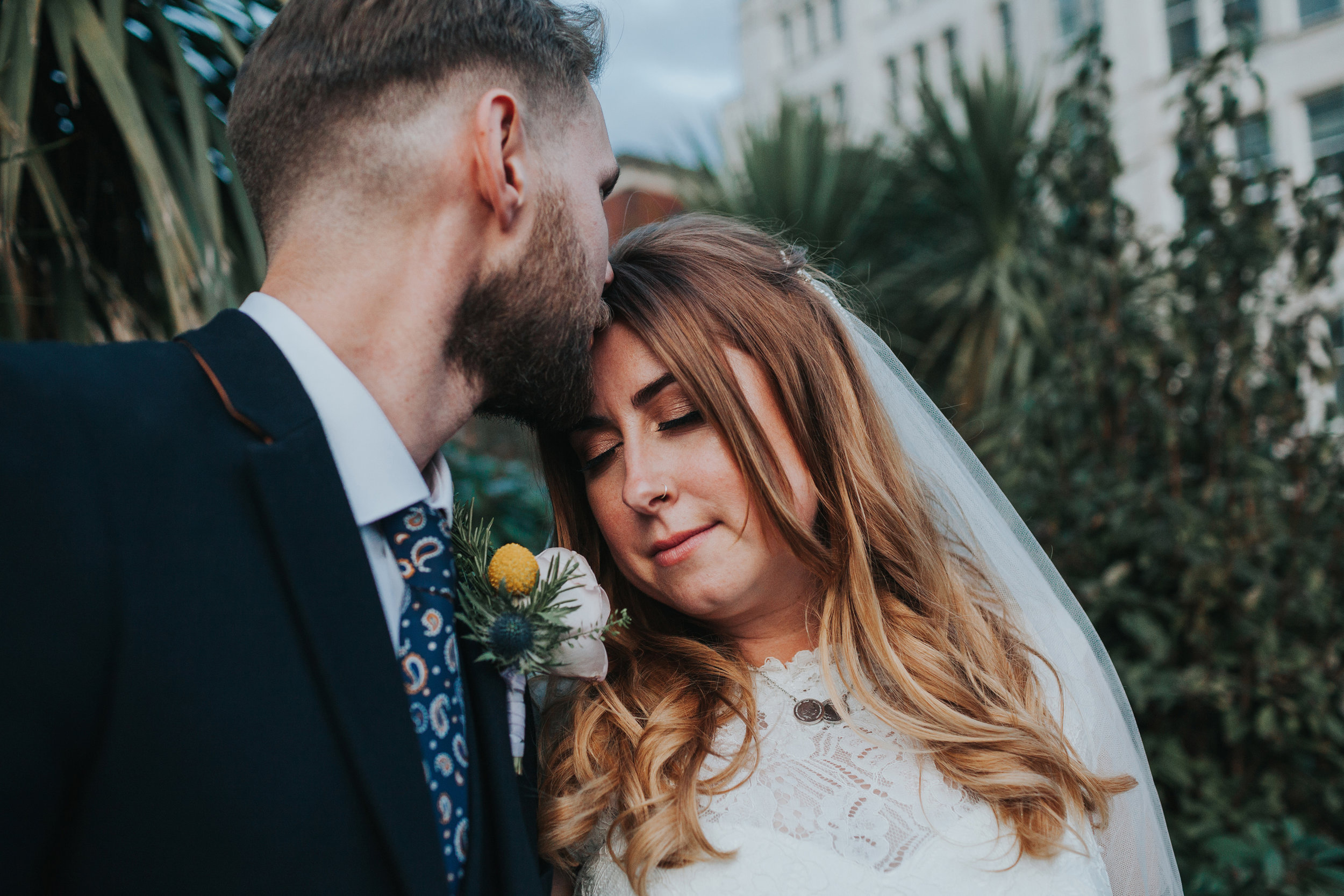 Couples portrait photograph in colour.