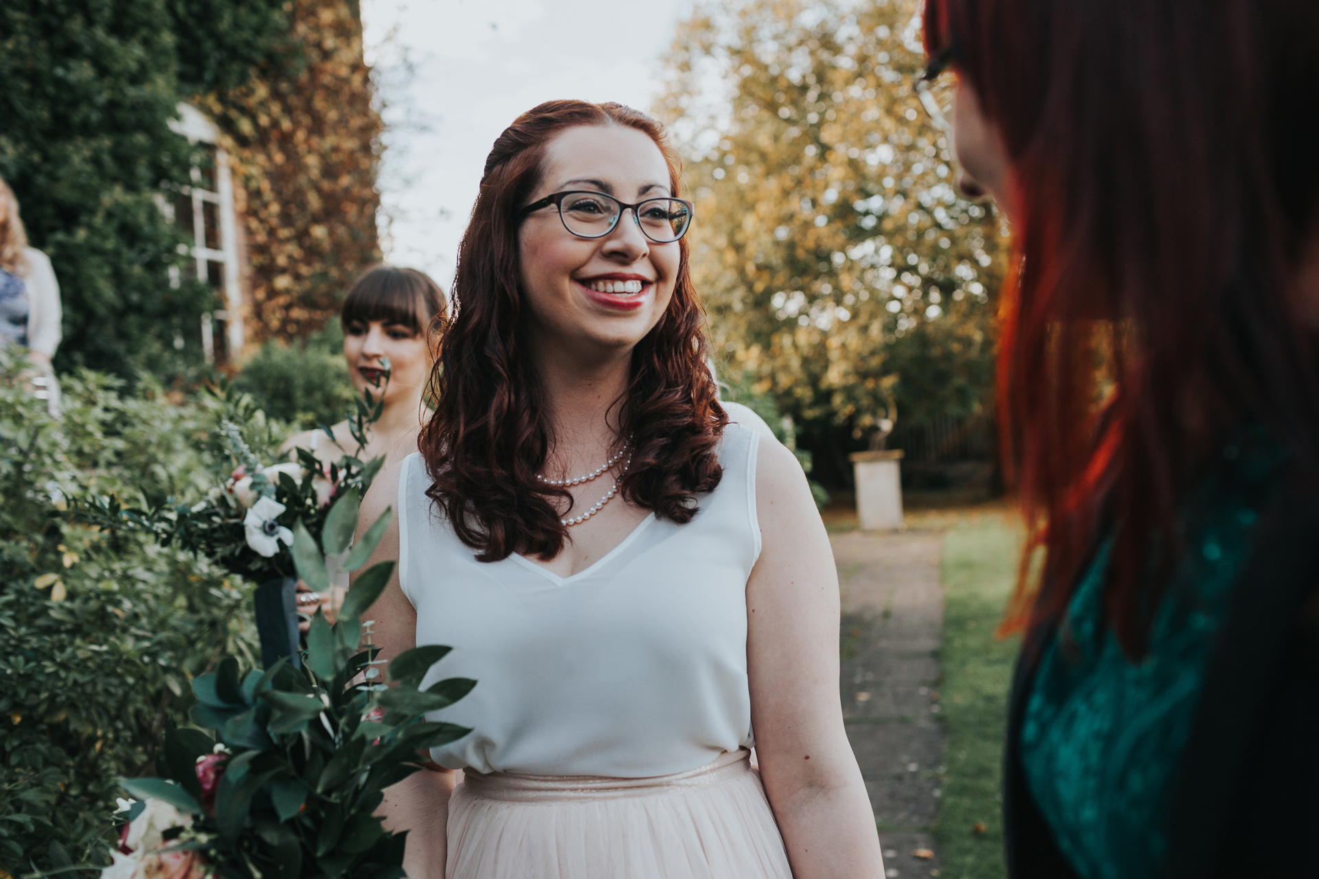 Bridesmaid chatting with friends. 