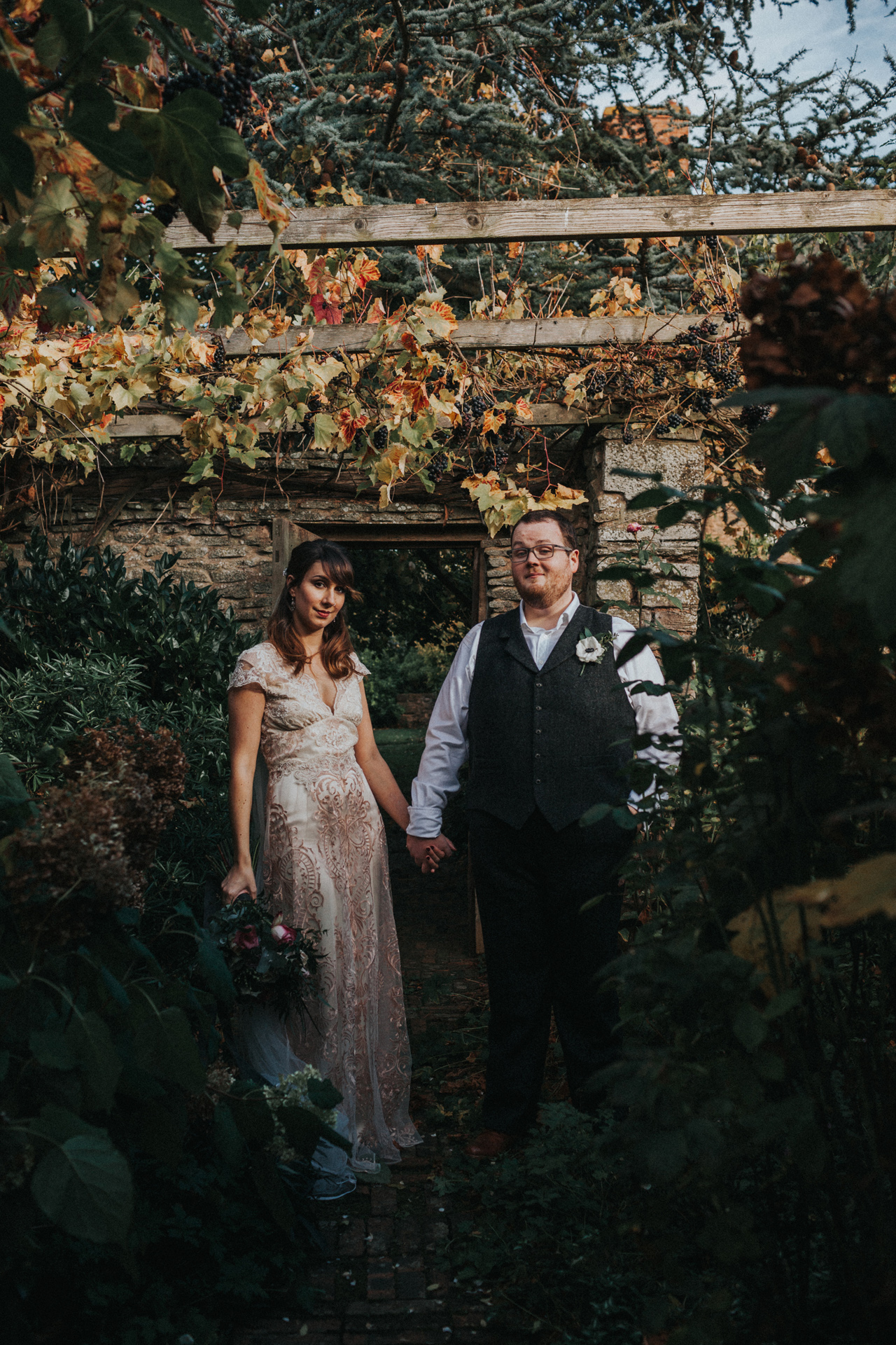Photograph of Bride and Groom in the grounds of Dewsall Court. 