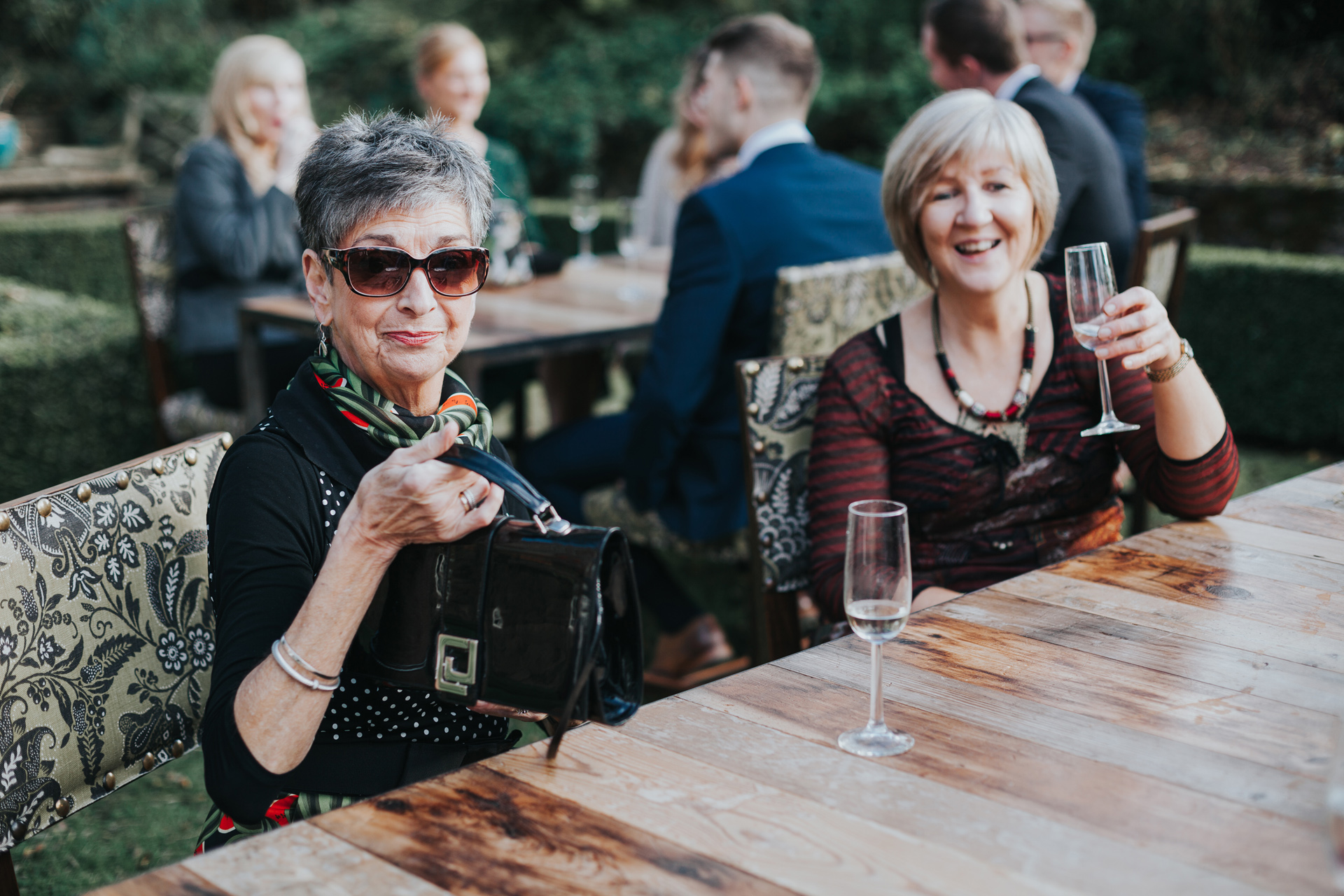 Weddings guests drinking champers. 