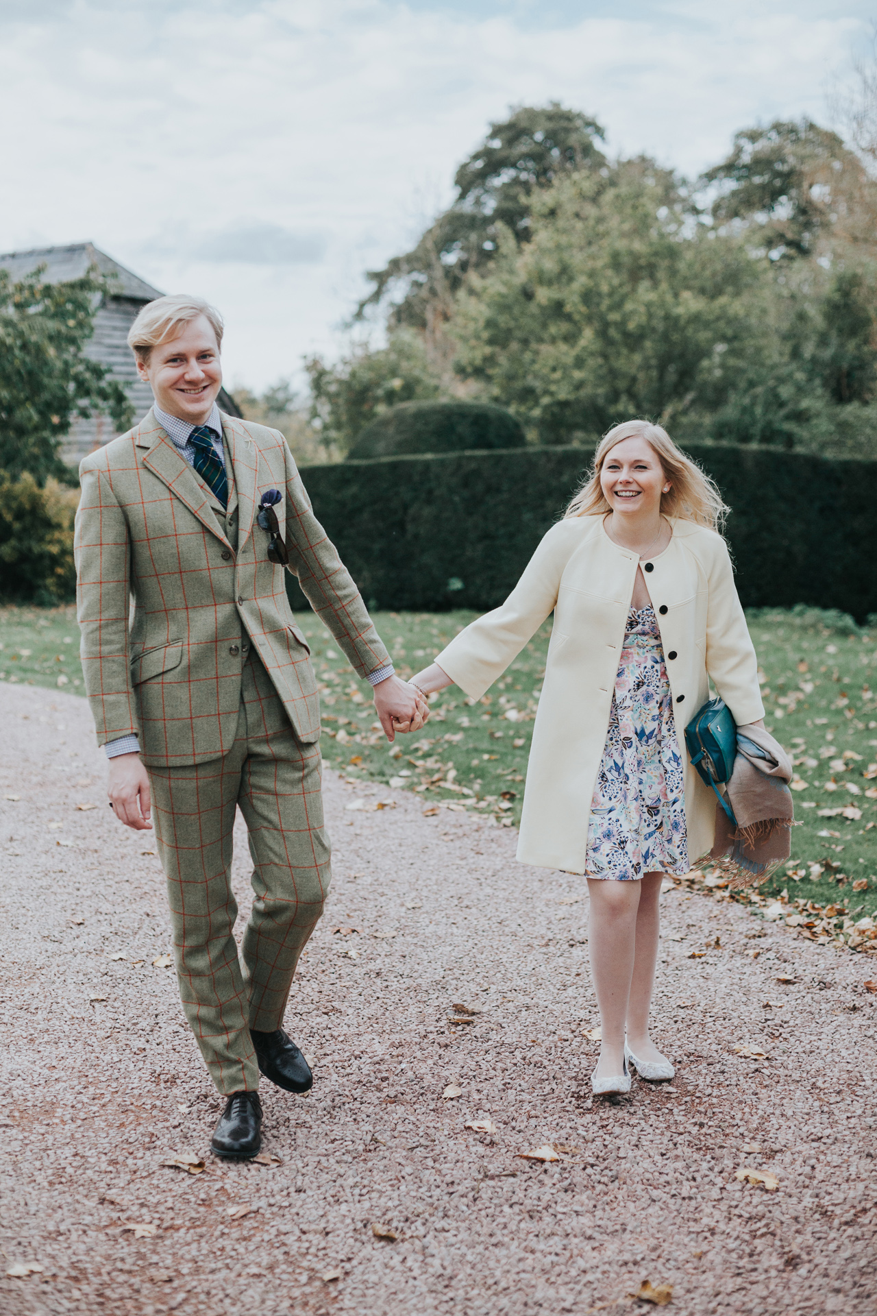 Wedding guests holing hands. 