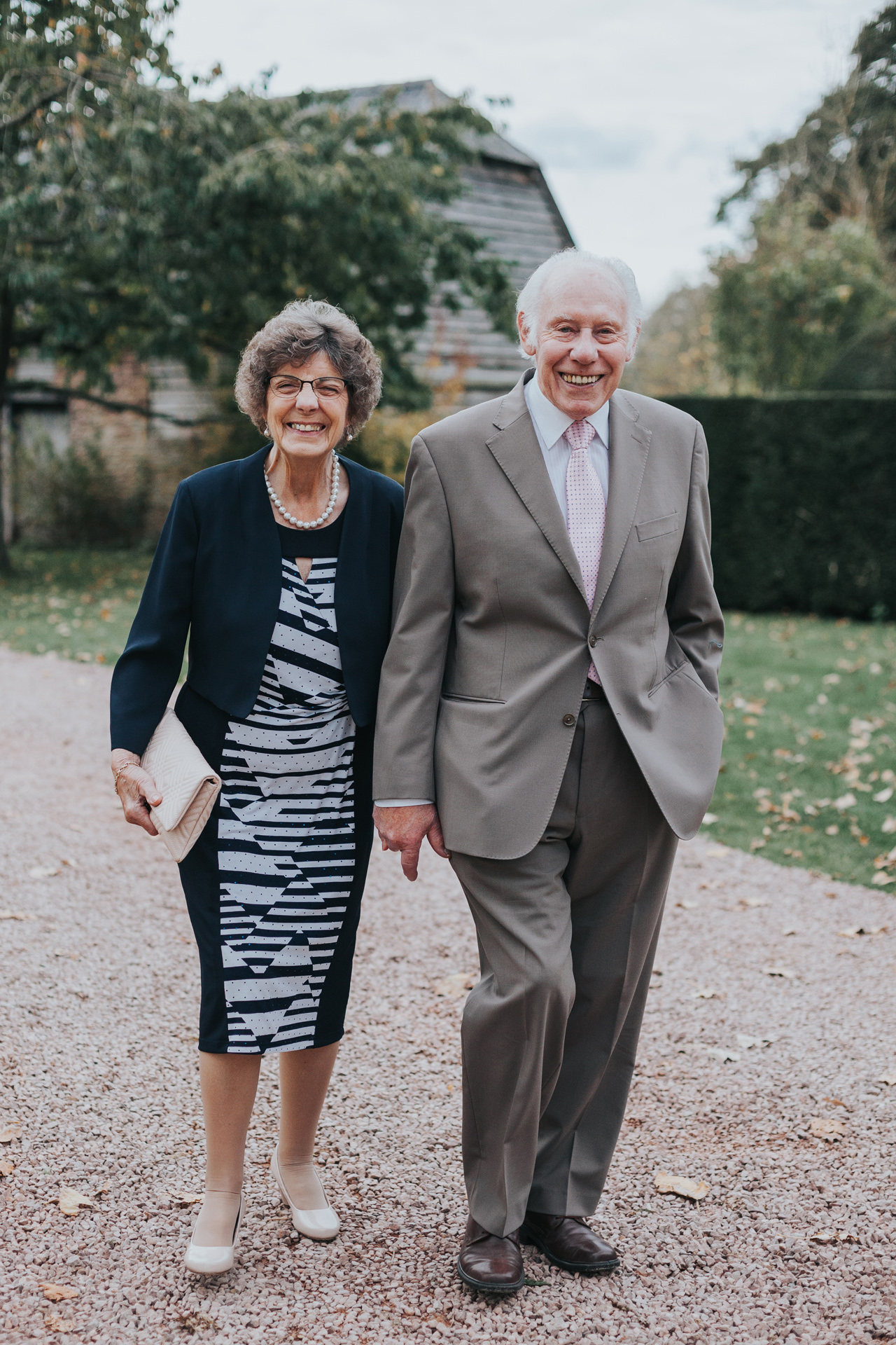 Wedding guests smiling.