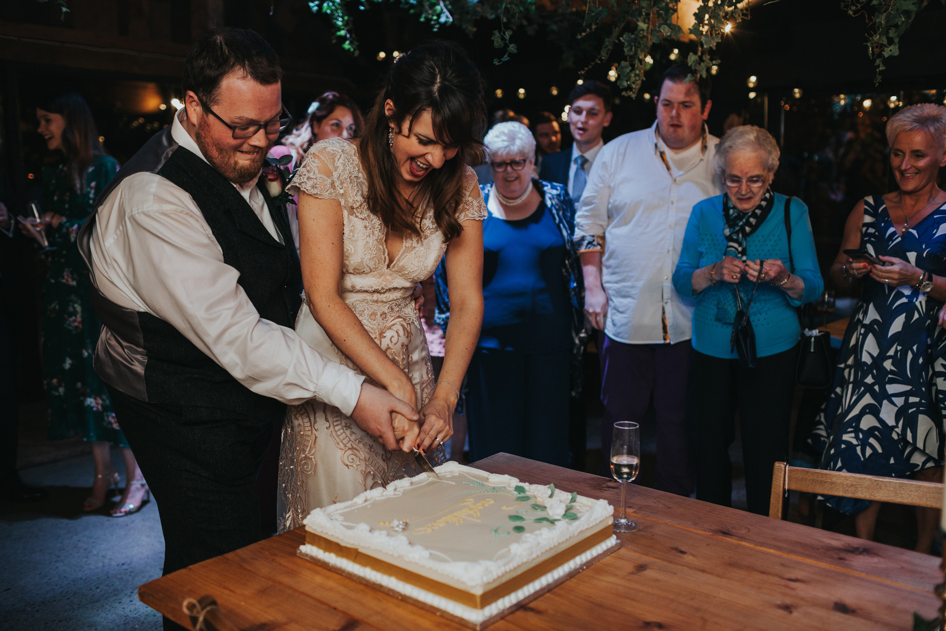 Bride and groom cut cake number two.