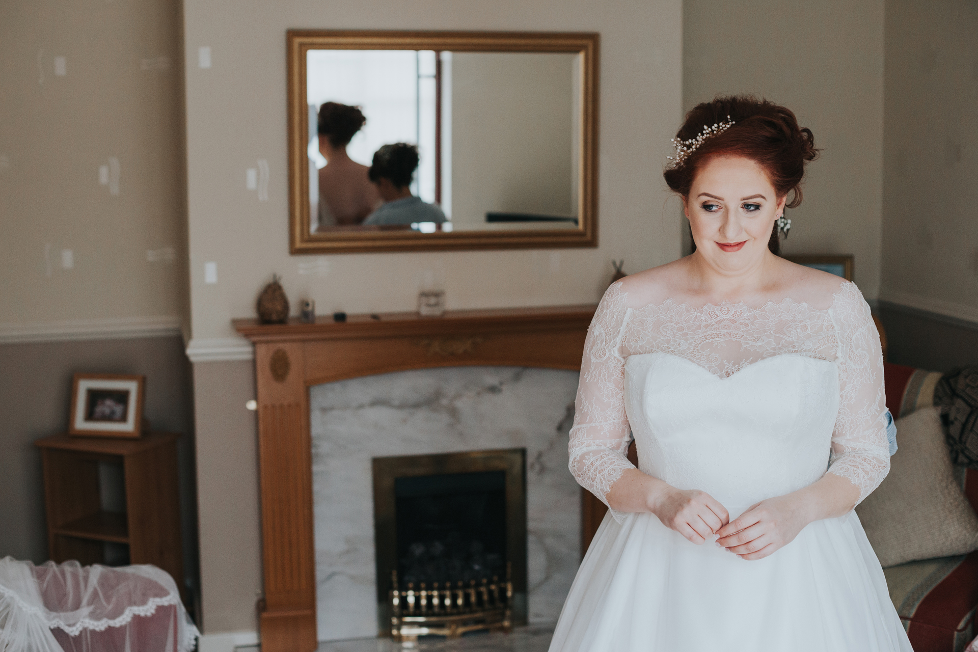 Bride smiling to herself. 