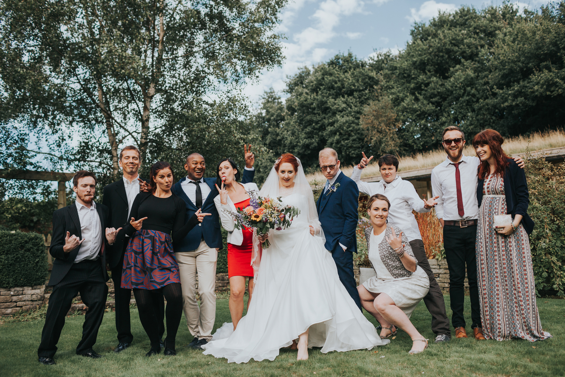 Bride and Groom posing with their mates. 