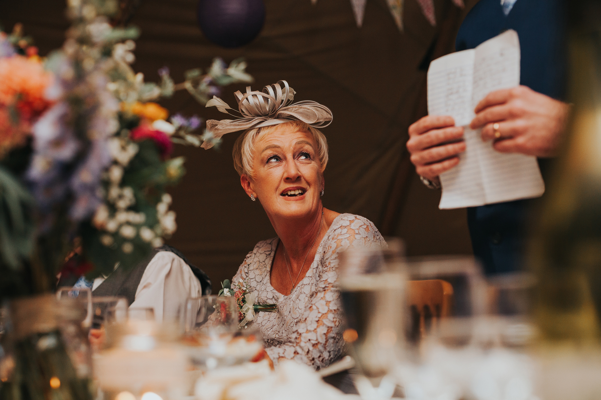 Mother of the bride listening to best mans speech. 