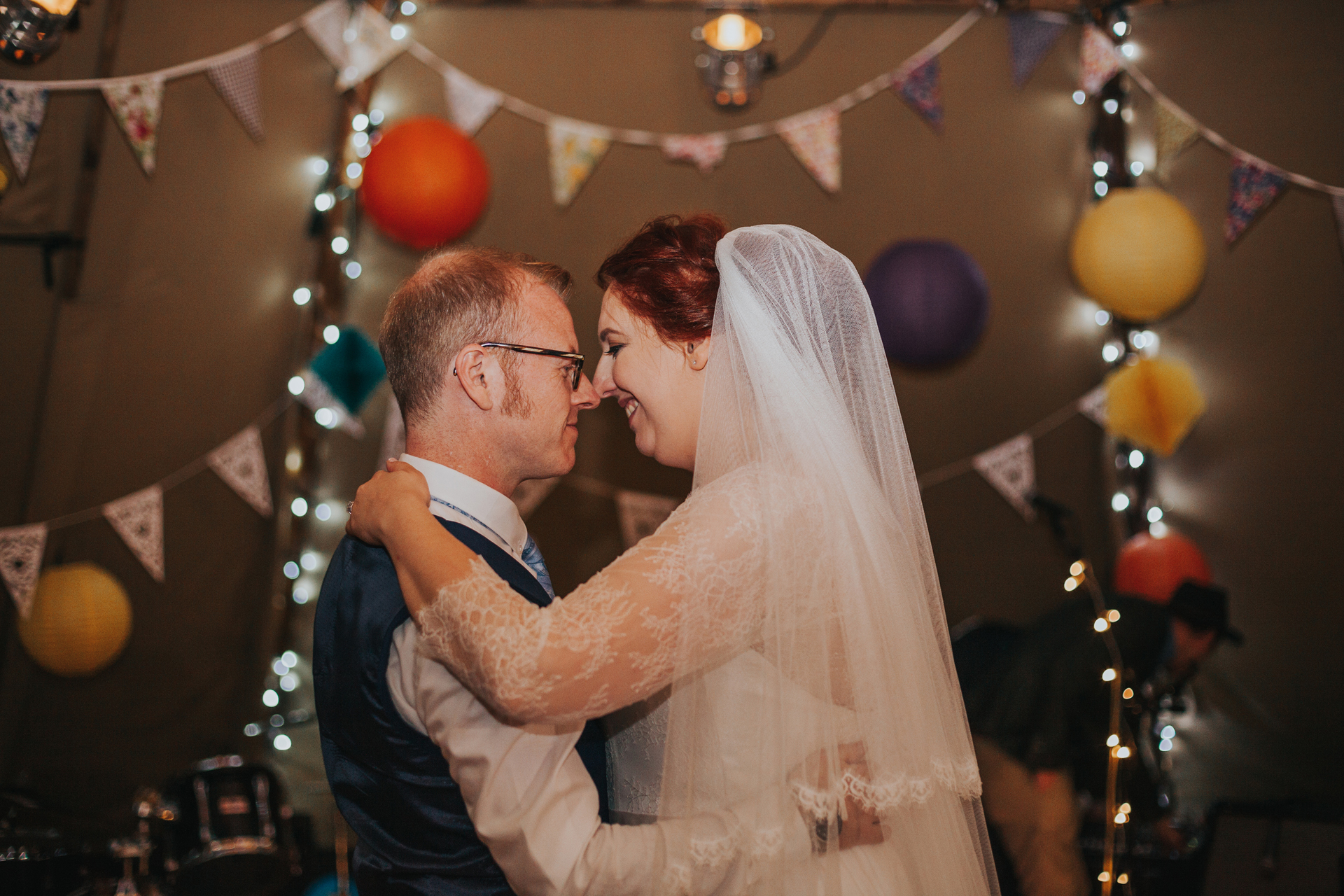 Bride and groom begin first dance. 