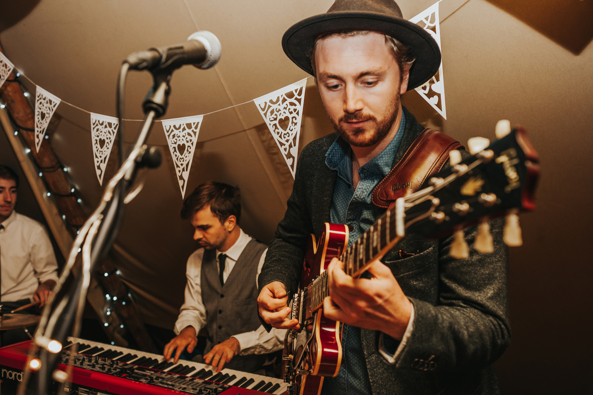 Guitarist in wedding band. 