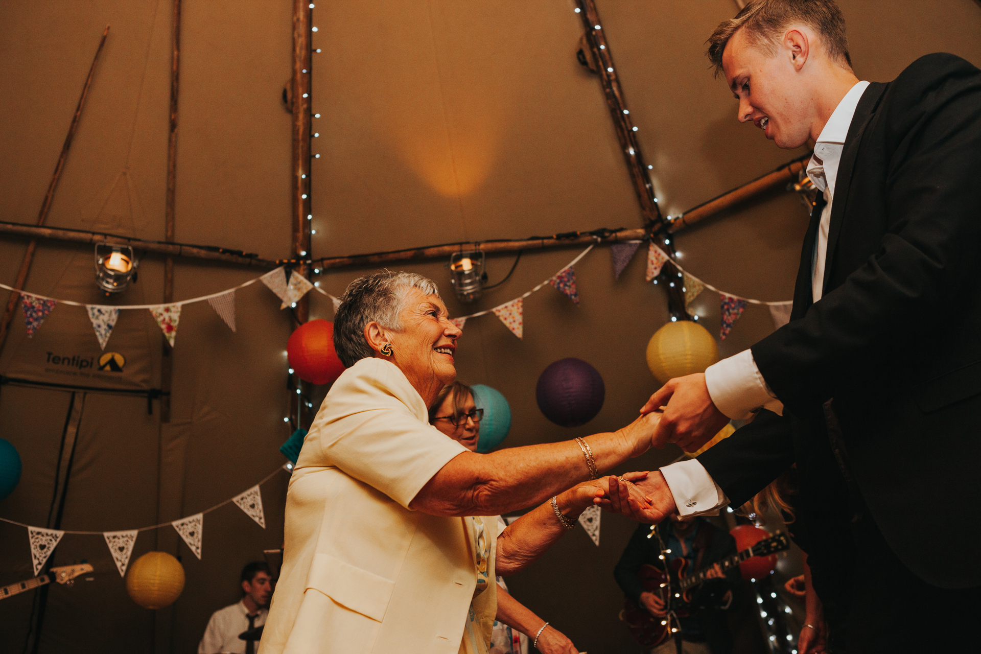 Guests dancing in tipi at Trafford Hall Wedding.