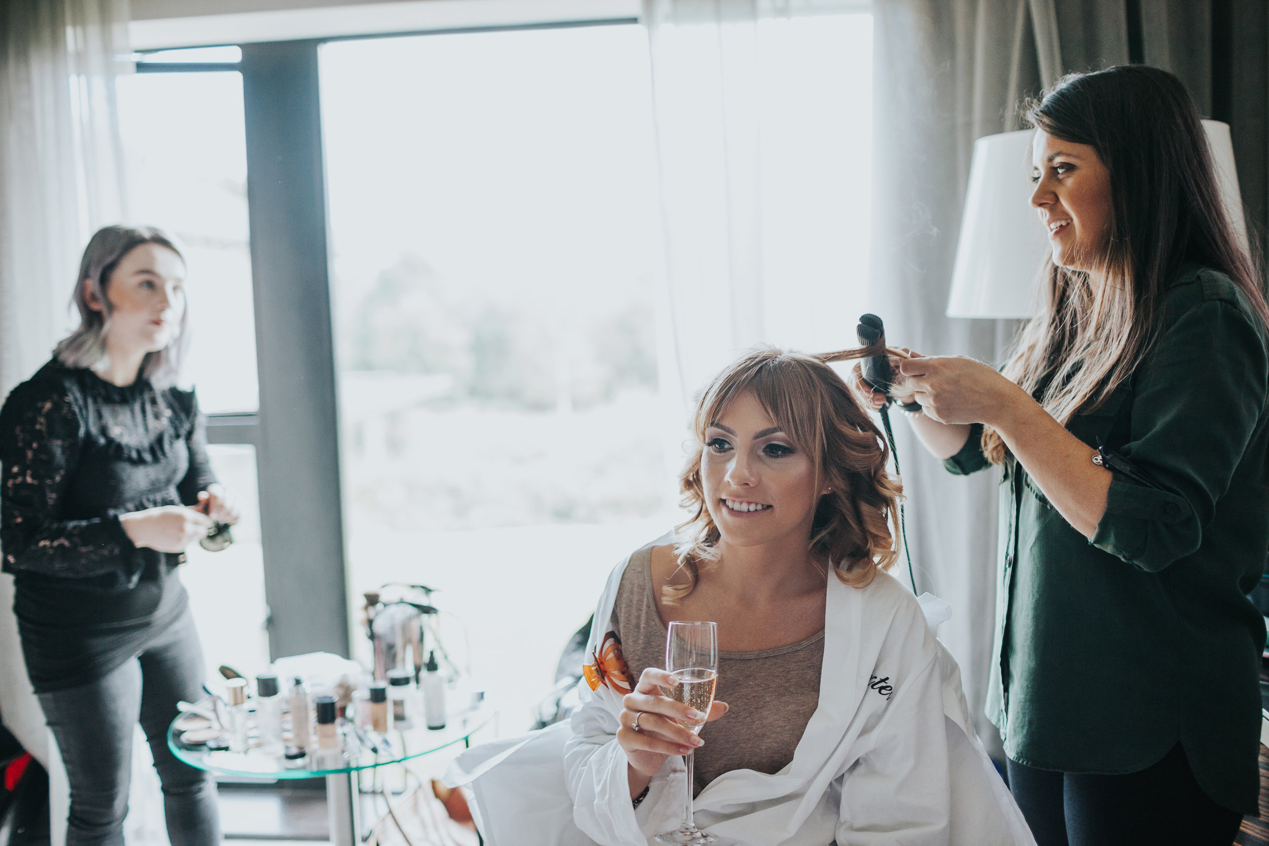 Bridesmaids getting ready. 