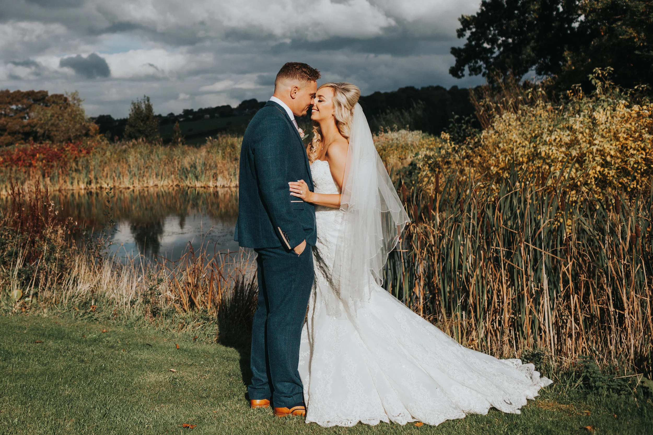 Bride and Groom kiss.
