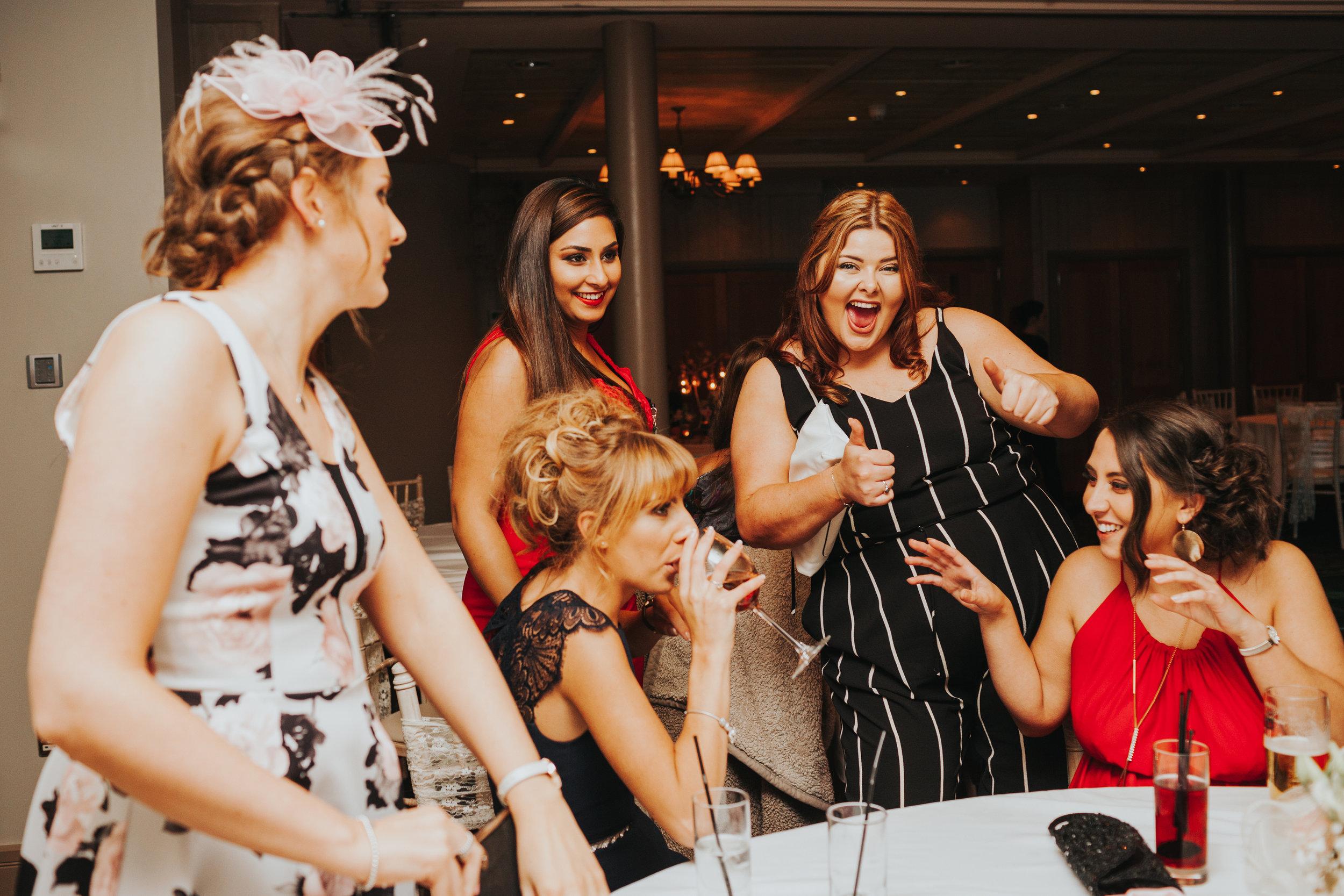 Female guests laughing together.