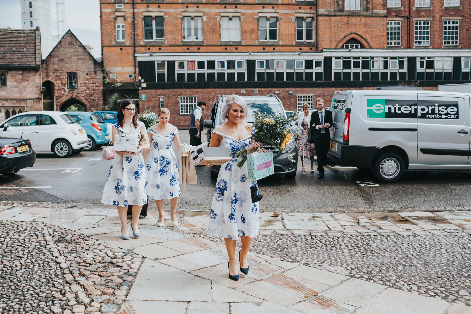 Bridesmaids arrive at Chetham's Library Manchester.