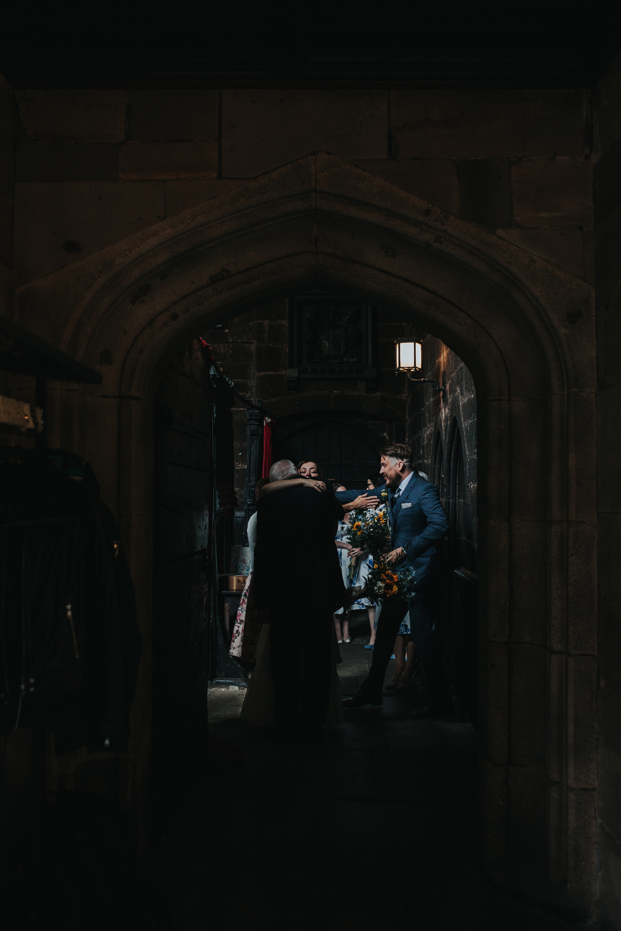 Hugs in the door way at Chetham's Library Manchester.