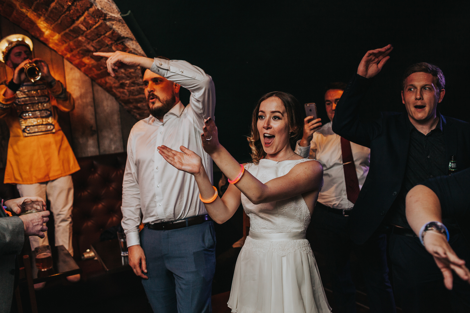 Bride and Groom throw some shapes at Lock 91 Wedding Reception. 