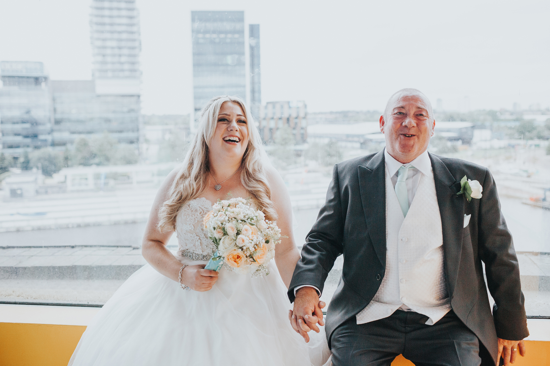 Bride and her father share a moment together before entering The Compass Room.