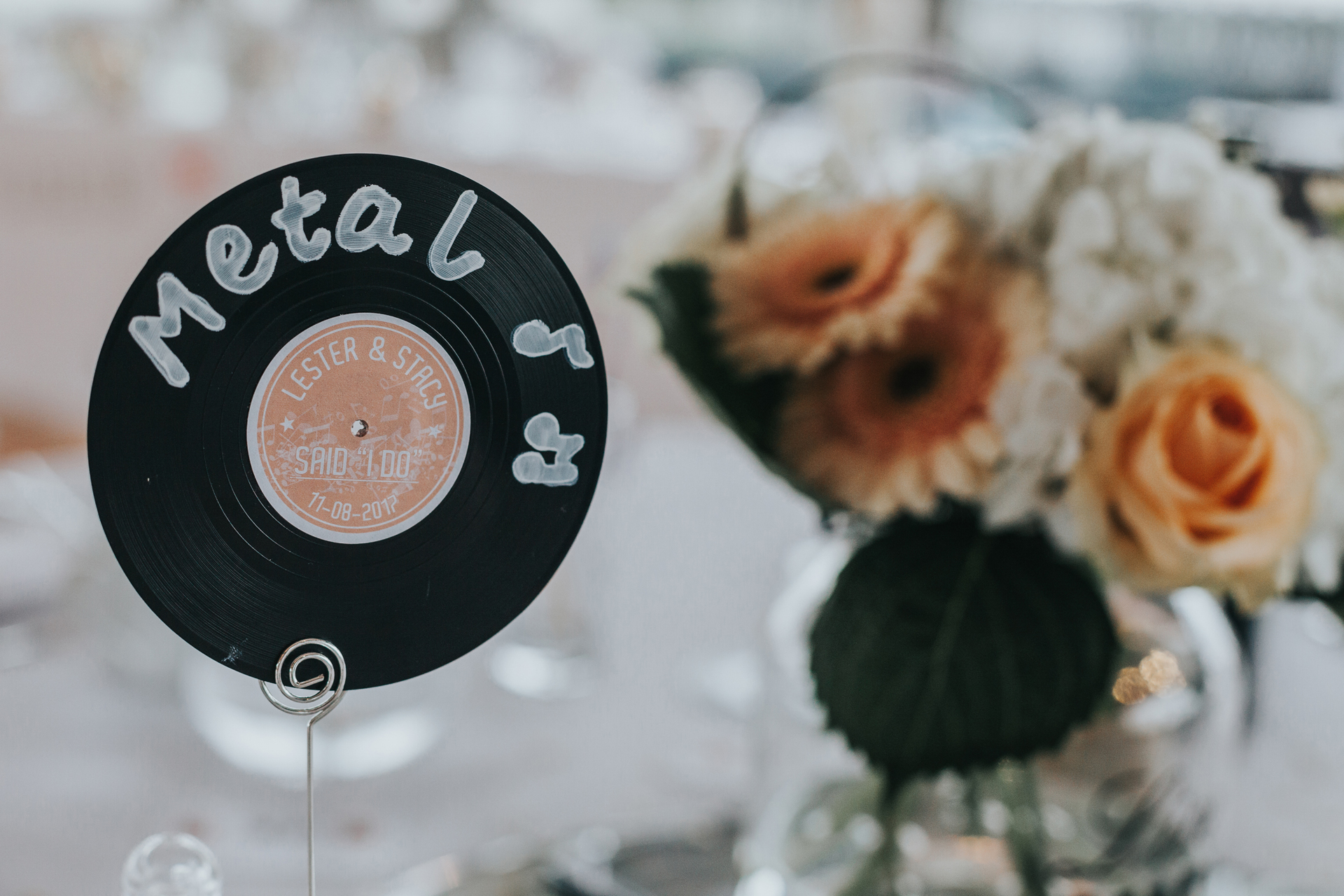 Record table sign saying Metal. 