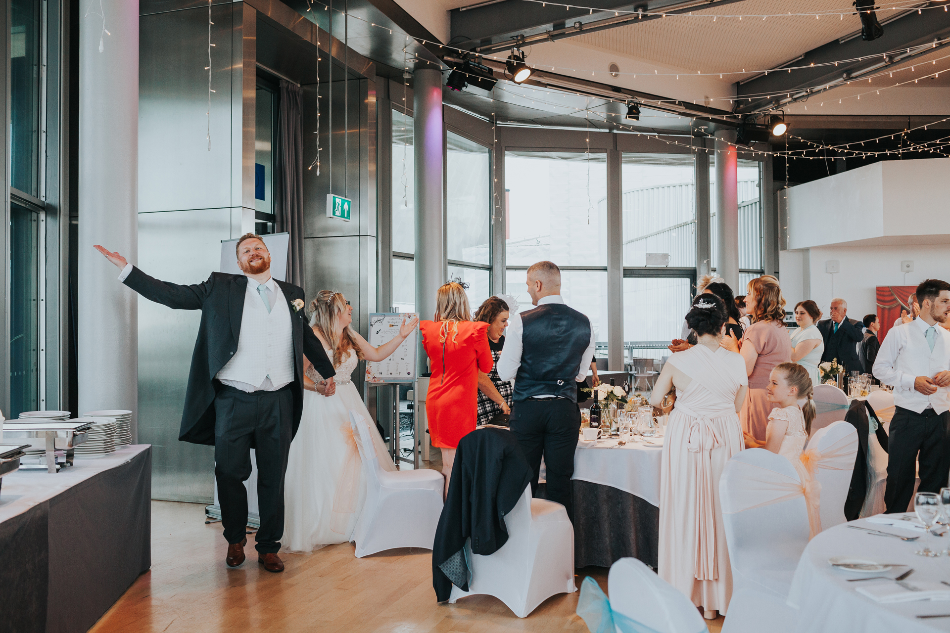 The Bride and Groom enter the Compass room like legends. 