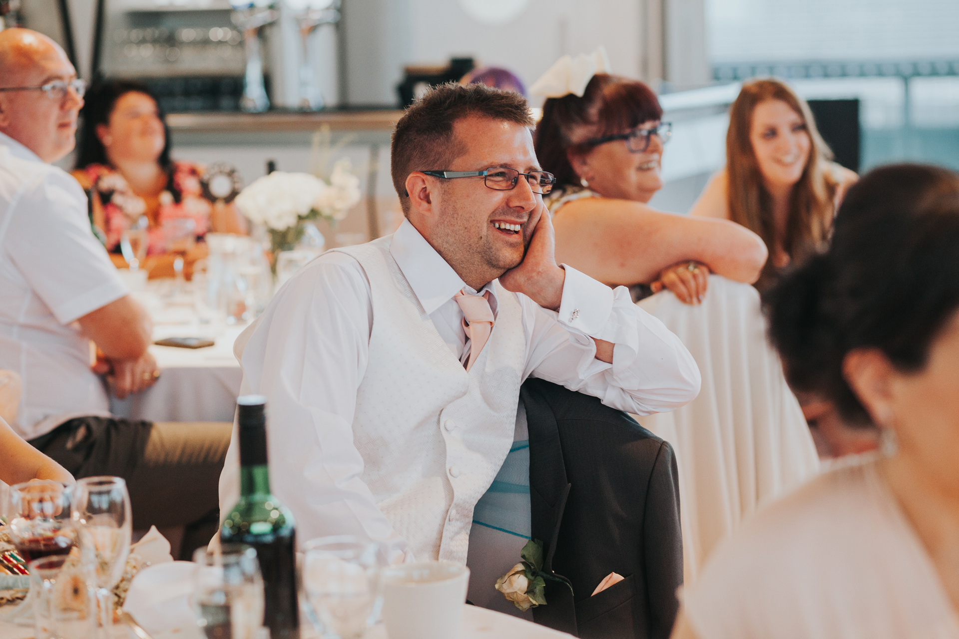 Best Man laughing at Groom's speech. 