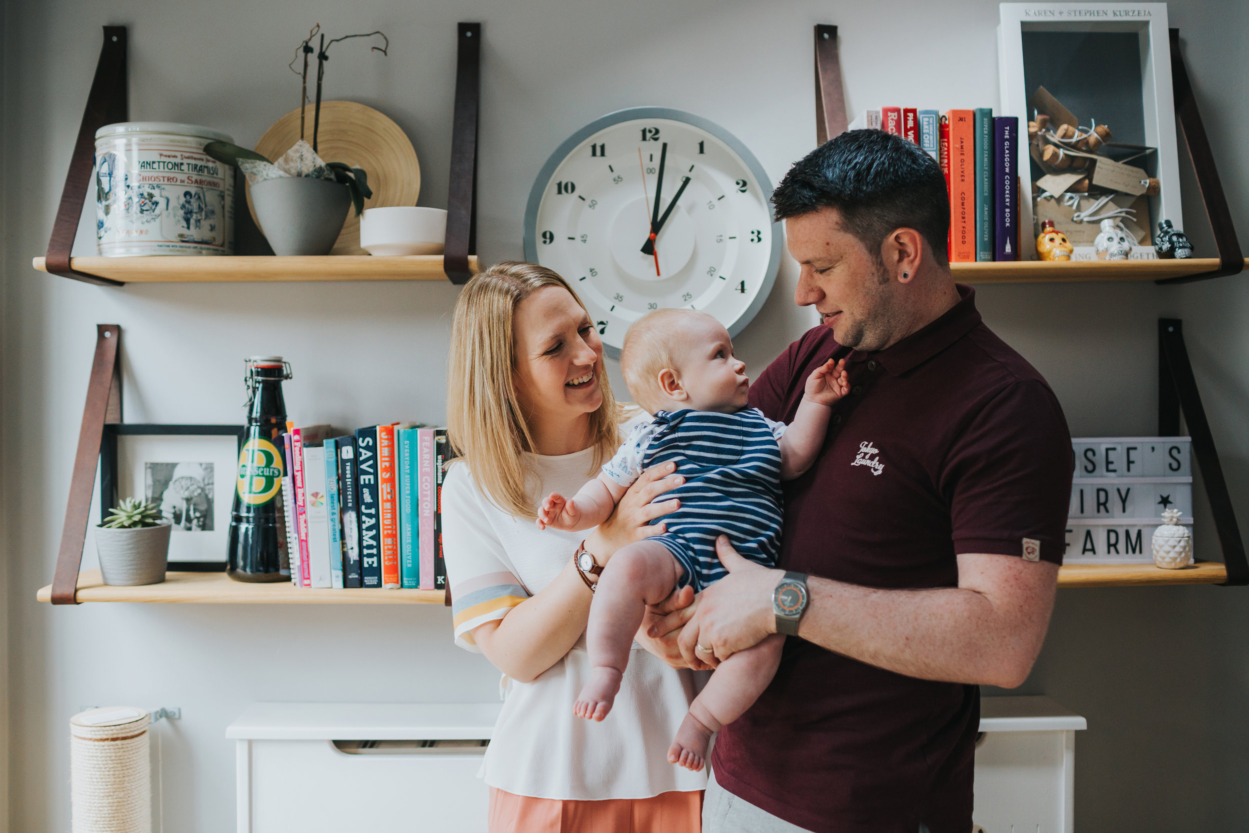 Family together in kitchen. 