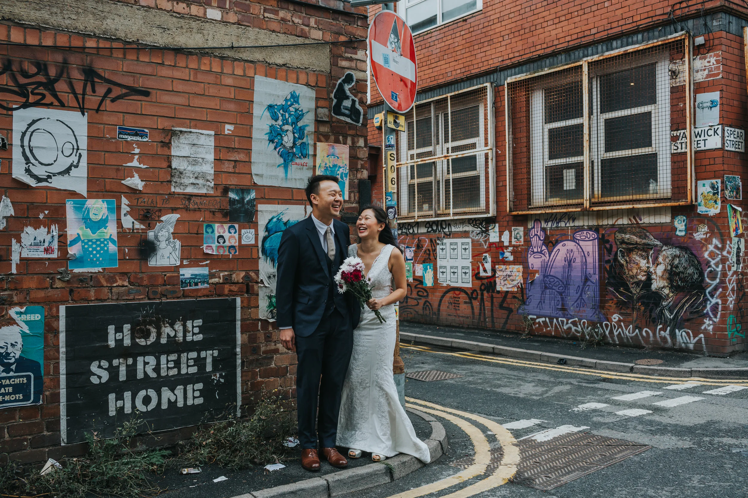 Couple laugh together at Home Street Home Manchester. 
